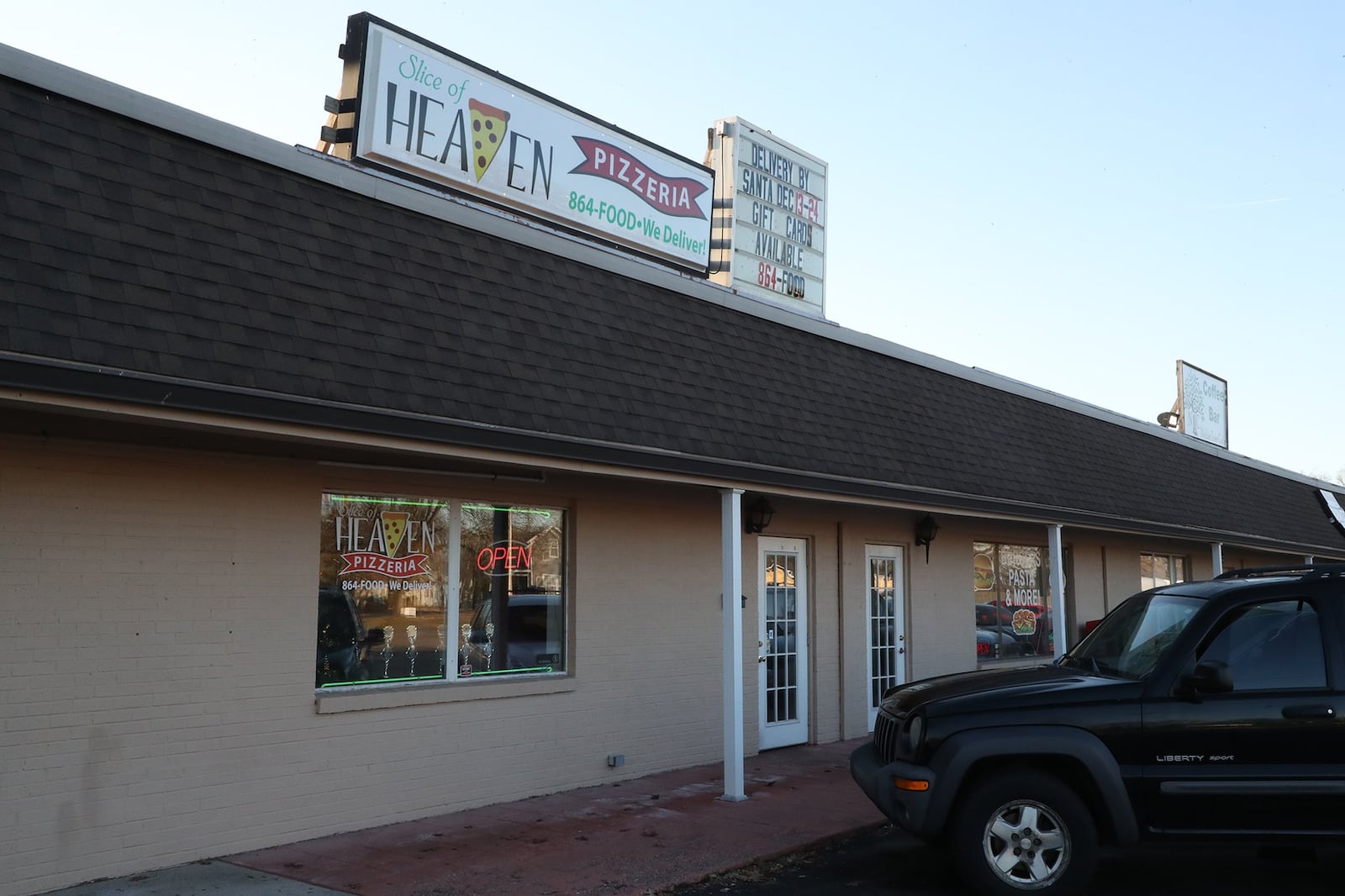 Slice of Heaven Pizzeria at 17 N. Xenia Drive in Enon. BILL LACKEY/STAFF