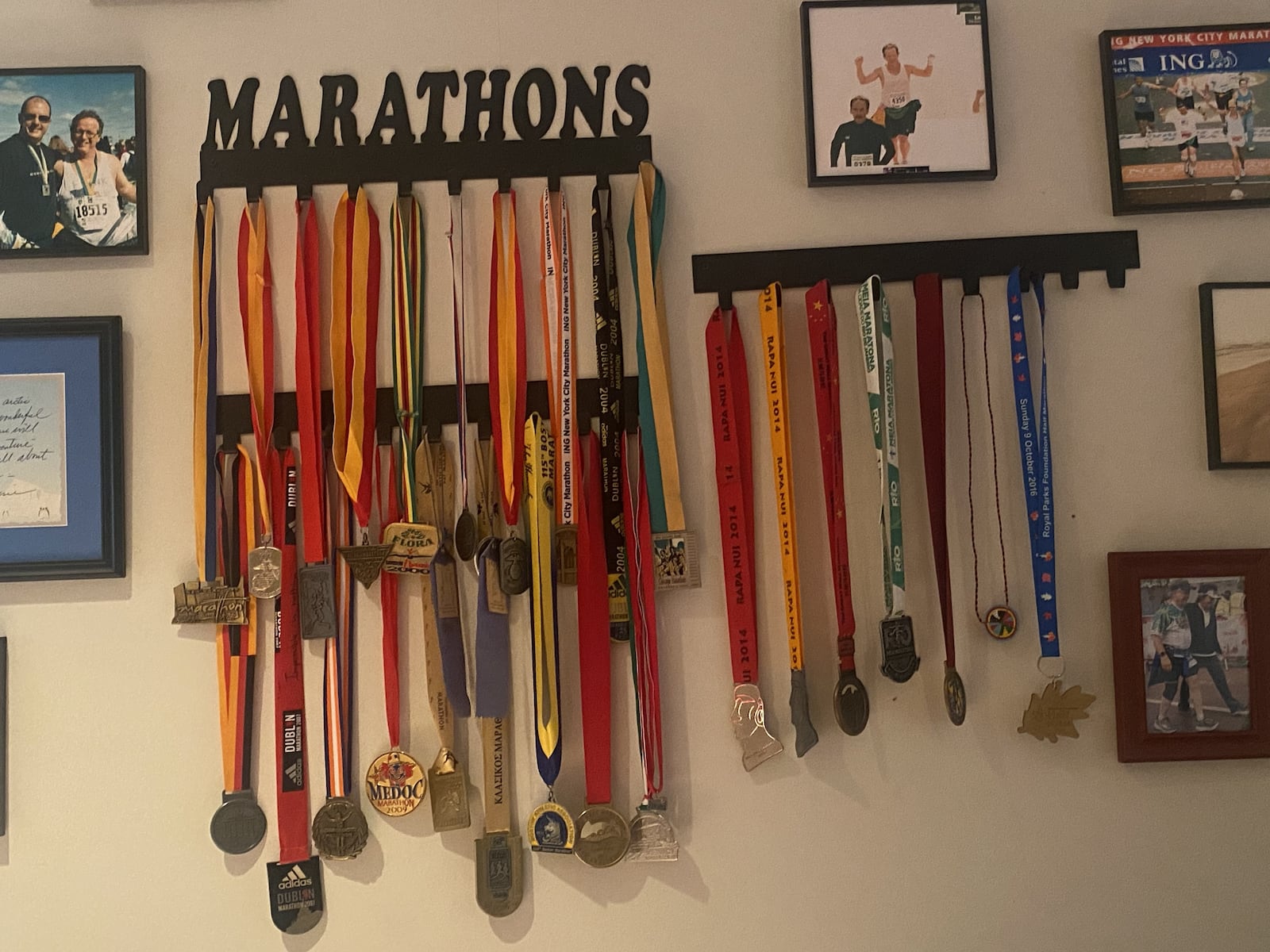 Frank Williams keeps his many marathon and half-marathon medals on display at his home. CONTRIBUTED