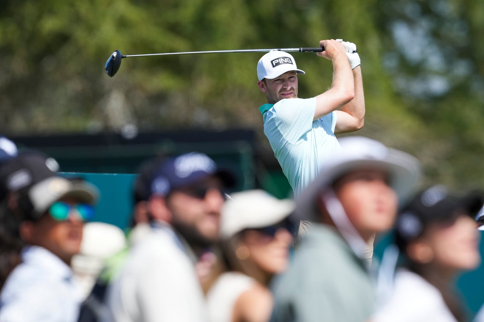 Brian Campbell, of the United States, watches his tee shot on the third hole during the final round of the Mexico Open golf tournament in Puerto Vallarta, Mexico, Sunday, Feb. 23, 2025. (AP Photo/Fernando Llano)