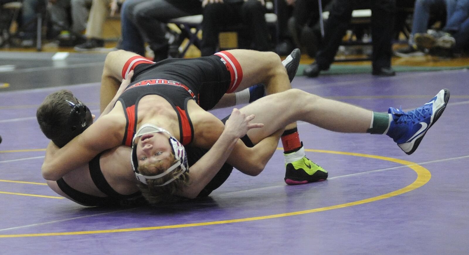 Cyle Wells of Tecumseh (top) pinned Zander Ellison of Hilliard Bradley in 2:56 to place third at 138 pounds in the GMVWA Holiday Wrestling Tournament at Vandalia on Friday, Dec. 28, 2018. MARC PENDLETON / STAFF