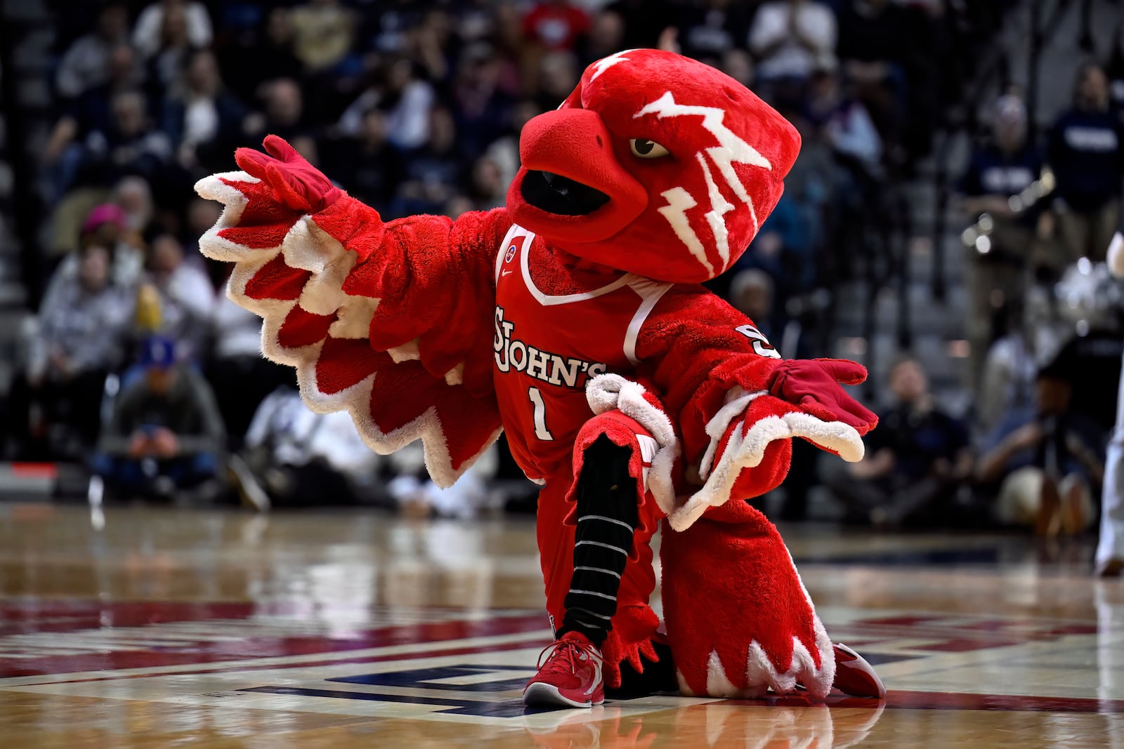 The St. John's mascot, Johnny the Thunderbird, performs during the first half of an NCAA college basketball game in the quarterfinals of the Big East Conference tournament, Saturday, March 8, 2025, in Uncasville, Conn. (AP Photo/Jessica Hill)