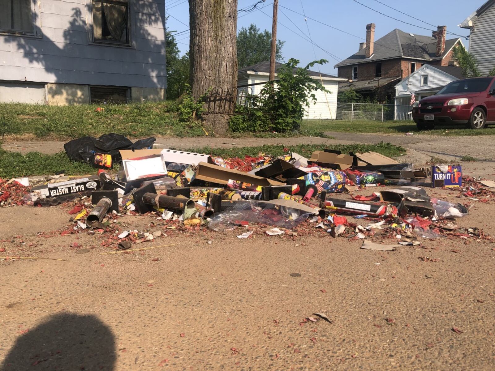 Used fireworks lie in a Dayton street on Sunday, July 5, 2021. Fireworks started around dark the night before and lasted deep into the night, with loud bangs coming from all directions. Cornelius Frolik / Staff