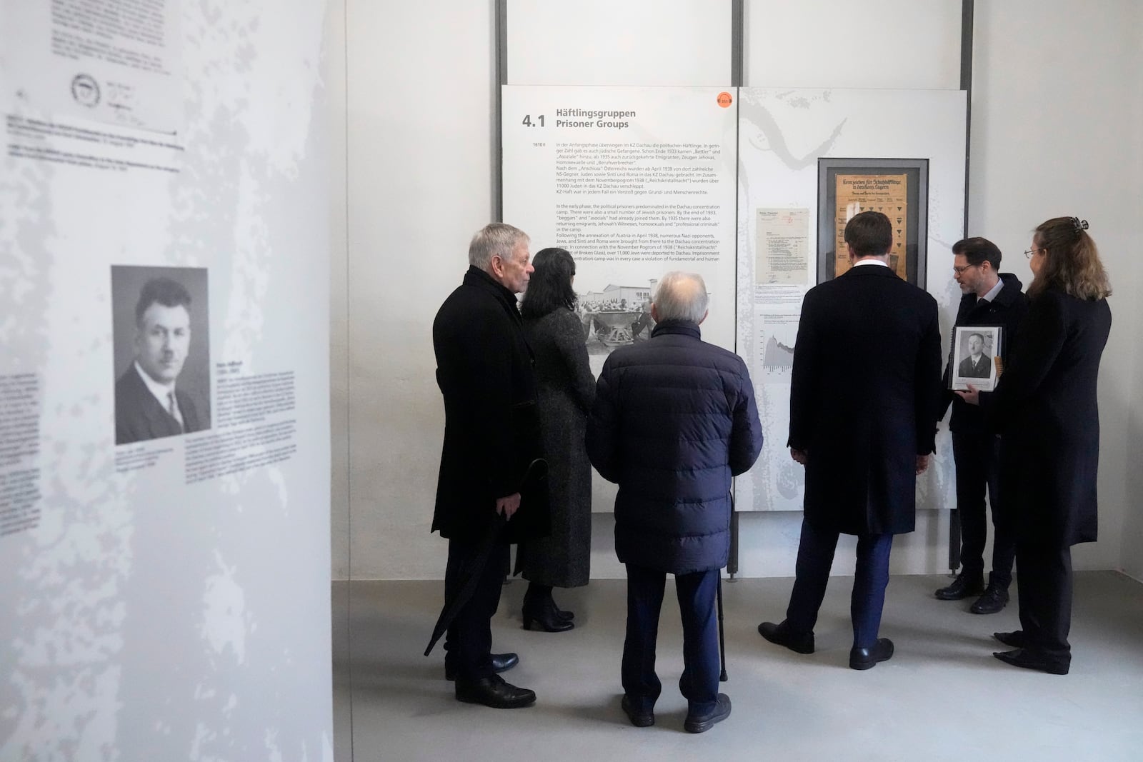 U.S. Vice President JD Vance, 3rd right, and second lady Usha Vance, 2nd left, visit the Dachau Concentration Camp Memorial Site outside Munich, Germany, Thursday, Feb. 13, 2025. (AP Photo/Matthias Schrader)