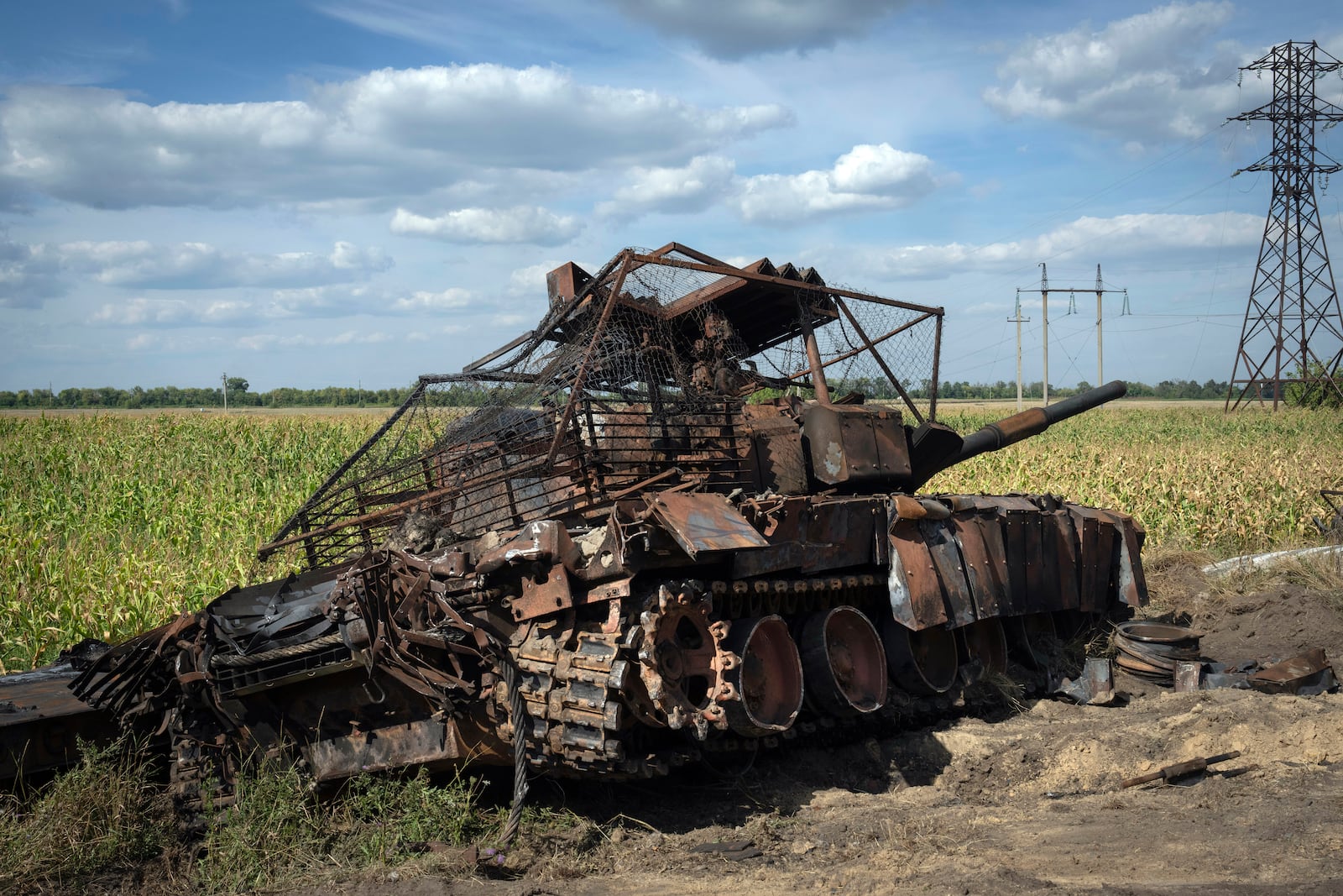 FILE - A destroyed Russian tank sits on a roadside near the town of Sudzha, Russia, in the Kursk region, on Aug. 16, 2024, in an image approved by the Ukrainian Defense Ministry. (AP Photo, File)