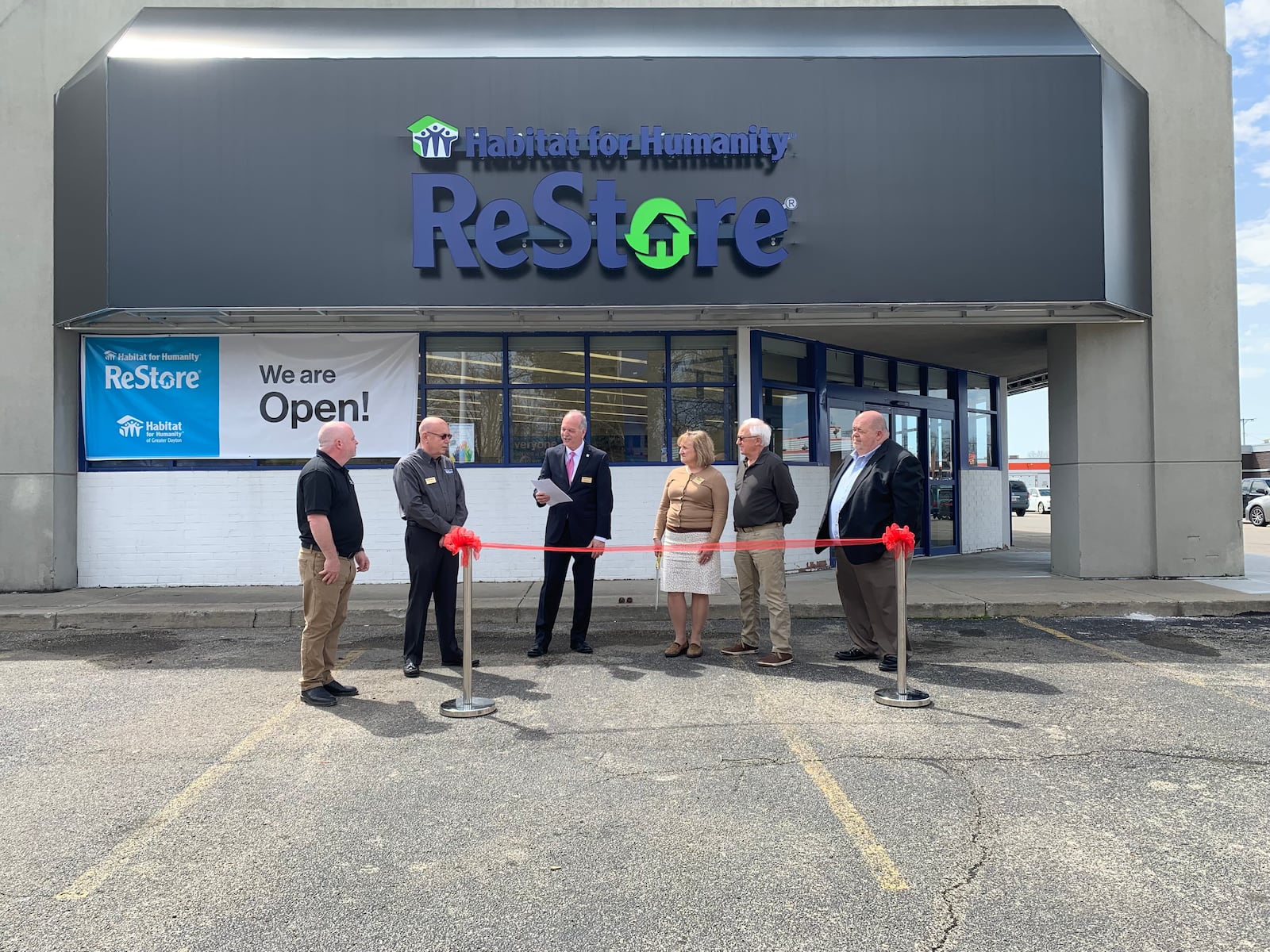 A grand opening and ribbon cutting of Habitat for Humanity of Greater Dayton’s new Springfield ReStore was held Friday at 2990 Derr Road. From left to right: ReStore General Manager Phil Kloos; Springfield ReStore Manager Scott Withers; Executive Director Norm Miozzi, board members SuAnn Newport and Vince Chase, and board president Eric Bugger. Brooke Spurlock/Staff