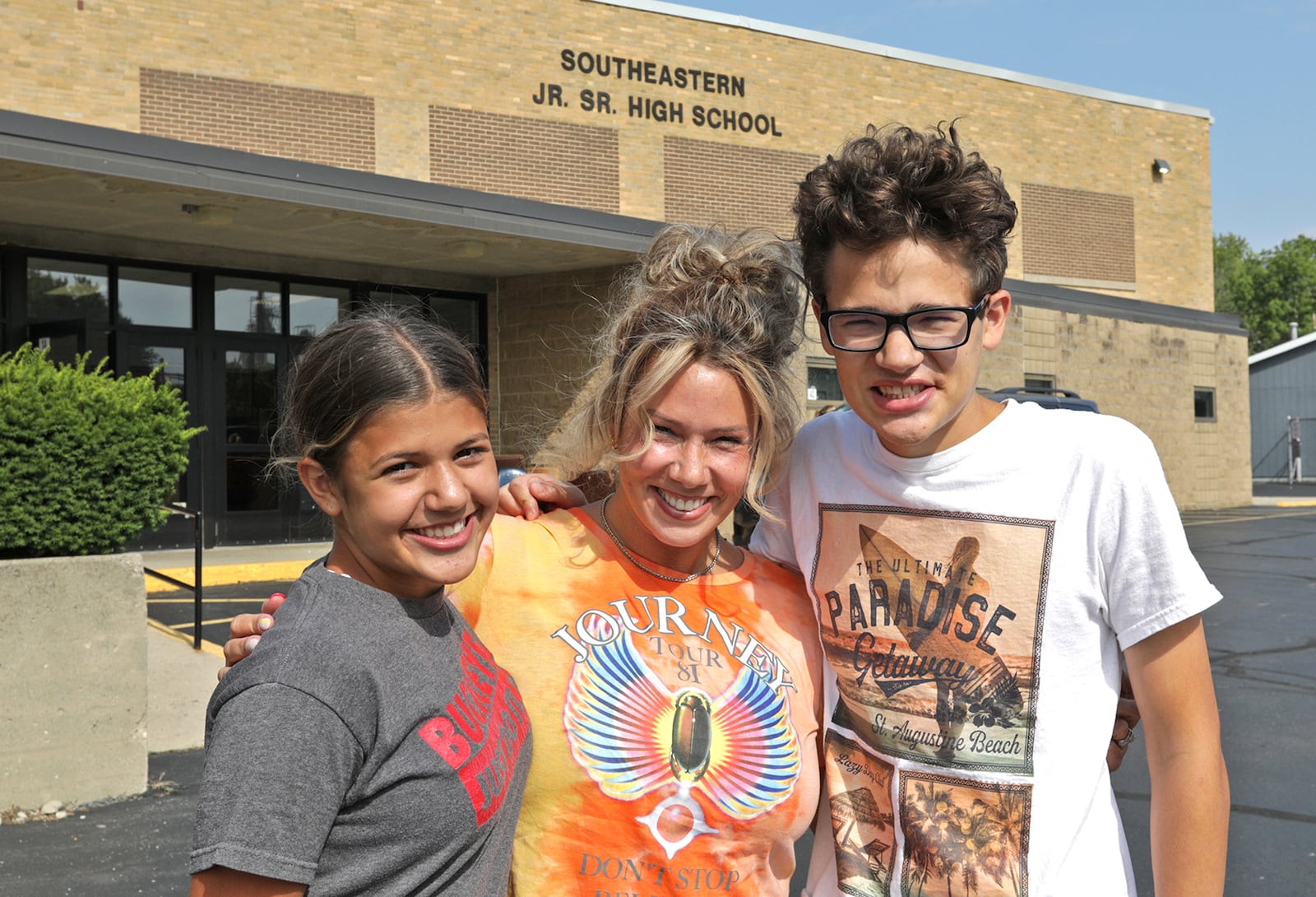 Vickie South with her children Ava and Connor are getting ready to go back to school in the fall. BILL LACKEY/STAFF