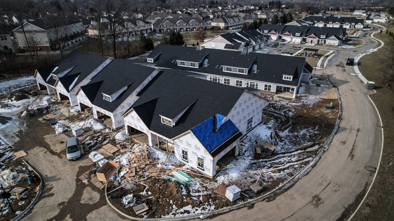 Townhomes are under construction at the Cottages of Beavercreek on County Line Rd., a Charles Simms Development project. Costs are driven up by supply chain problems that make it harder to get some products, including for home construction. JIM NOELKER/STAFF