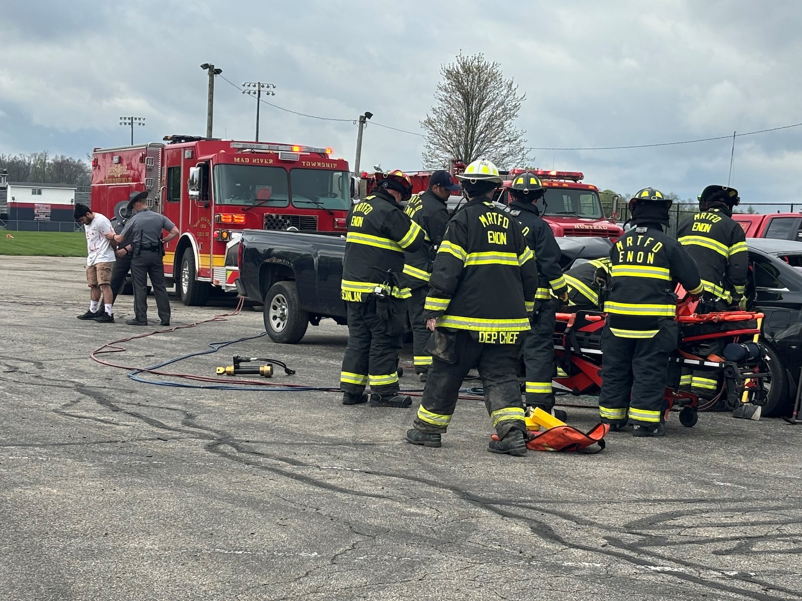 Greenon Local Schools hosted it’s mock crash event for junior and senior students on Thursday, April 17. The staged crash was complete with student actors and local emergency response teams for students to learn the consequences of impaired and distracted driving and the importance of making responsible daily driving choices, especially during celebratory events like prom night. The simulation event included Greenon, Clark County Sheriff’s Office, Enon-Mad River Fire and EMS, Hustead Fire and EMS, the Ohio State Highway Patrol, Premier Health Care Flight, Dan’s Towing and Recovery and Adkins Funeral Home. After the simulated crash, Greenon held an afternoon session for students with follow-up guest speakers, including speakers from Mothers Against Drunk Driving (MADD) and Tracy Locakhart-Williams from the Clark County Prosecutors Office to make sure that the message resonates beyond the initial shock of the simulation. Contributed