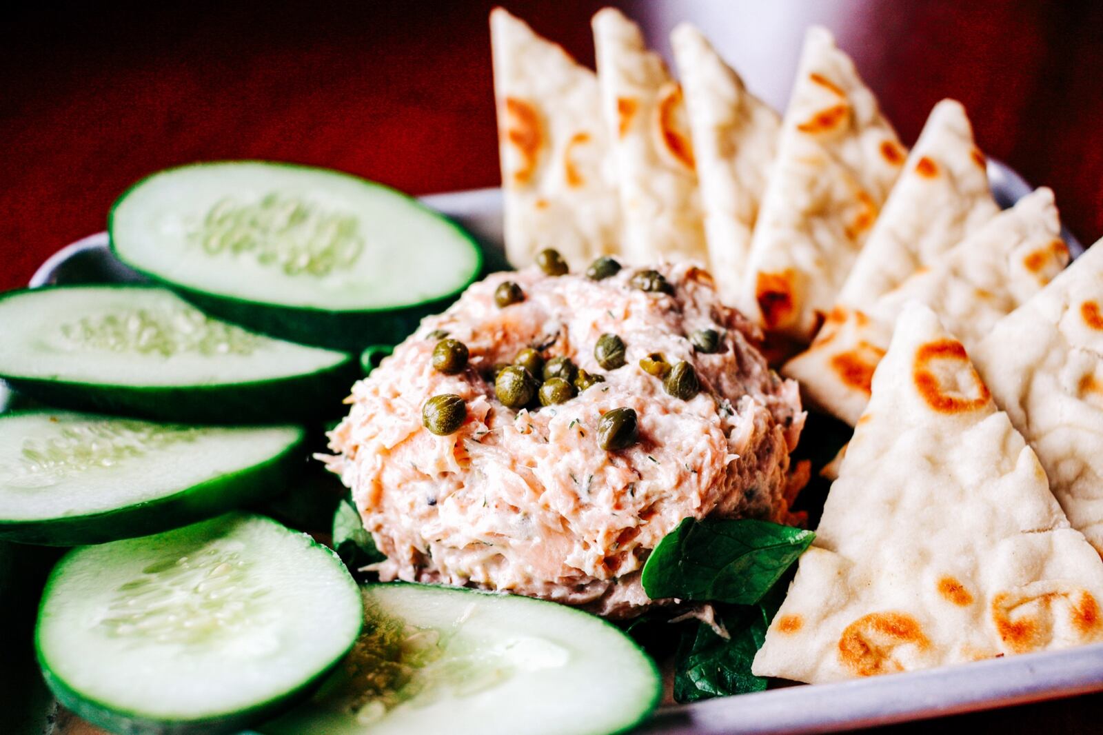 As the Rose Music Center at The Heights kicks off its concert season this week, Warped Wing is launching a concert night food menu at its brewery and smokery. Pictured is the smoked salmon spread (CONTRIBUTED PHOTO).