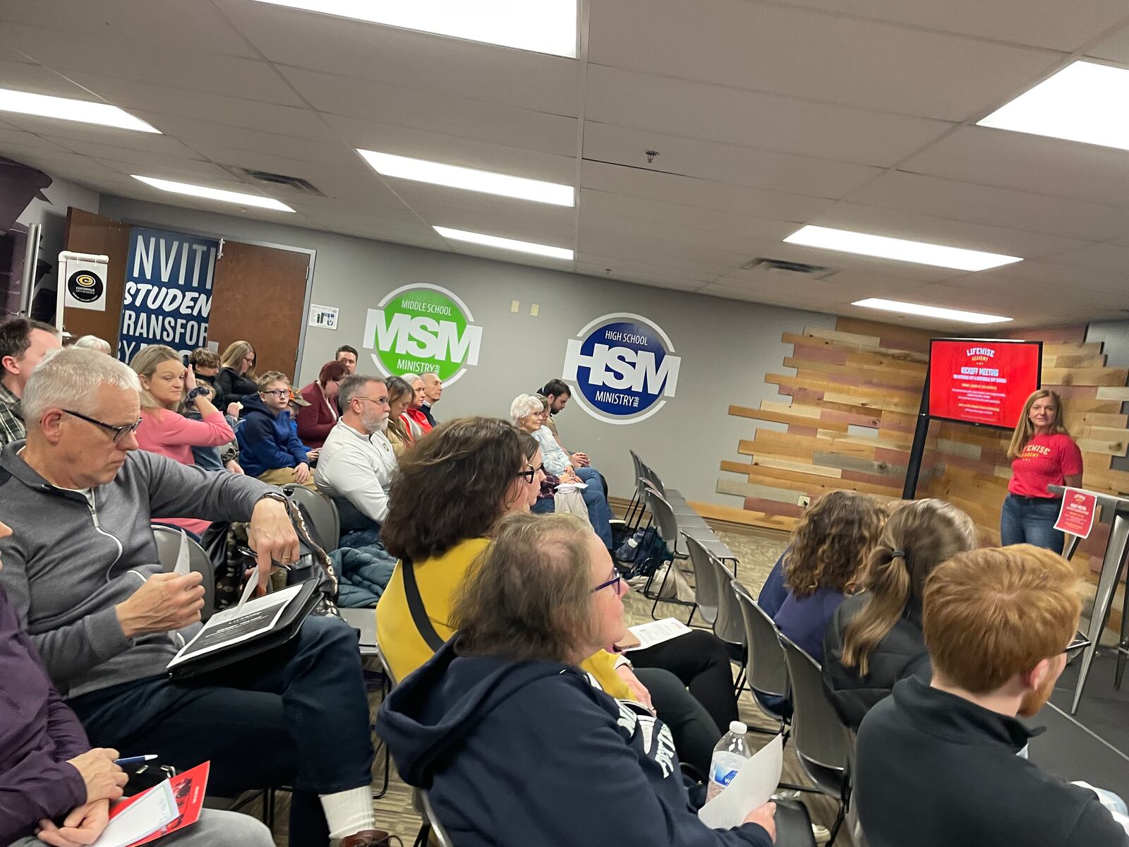 A First Baptist Church of Kettering member (at the far right near the red screen) was one of the presenters during a Jan. 25 meeting about LifeWise Academy school religion programs for residents of the Centerville and Kettering school districts. NICK BLIZZARD/STAFF