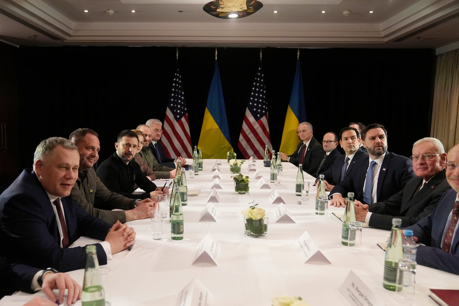 United States Vice-President JD Vance, third right, and United States Secretary of State Marco Rubio, fourth right, meet with Ukraine's President Volodymyr Zelenskyy, third left, during a bilateral meeting on the sidelines of the Munich Security Conference in Munich, Germany, Friday, Feb. 14, 2025. (AP Photo/Matthias Schrader)