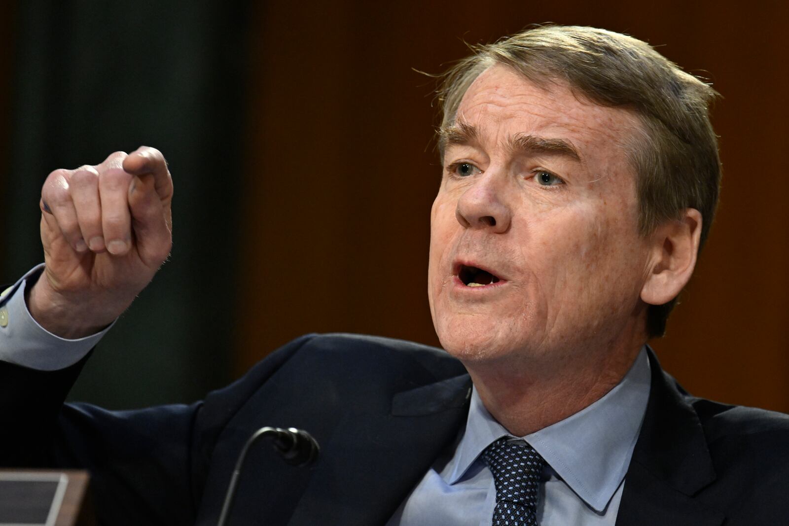 Sen. Michael Bennet, D-Colo., questions former Rep. Tulsi Gabbard, President Donald Trump's choice to be the Director of National Intelligence, during the Senate Intelligence Committee hearings for her confirmation at the U.S. Capitol, Thursday, Jan. 30, 2025, in Washington. (AP Photo/John McDonnell)