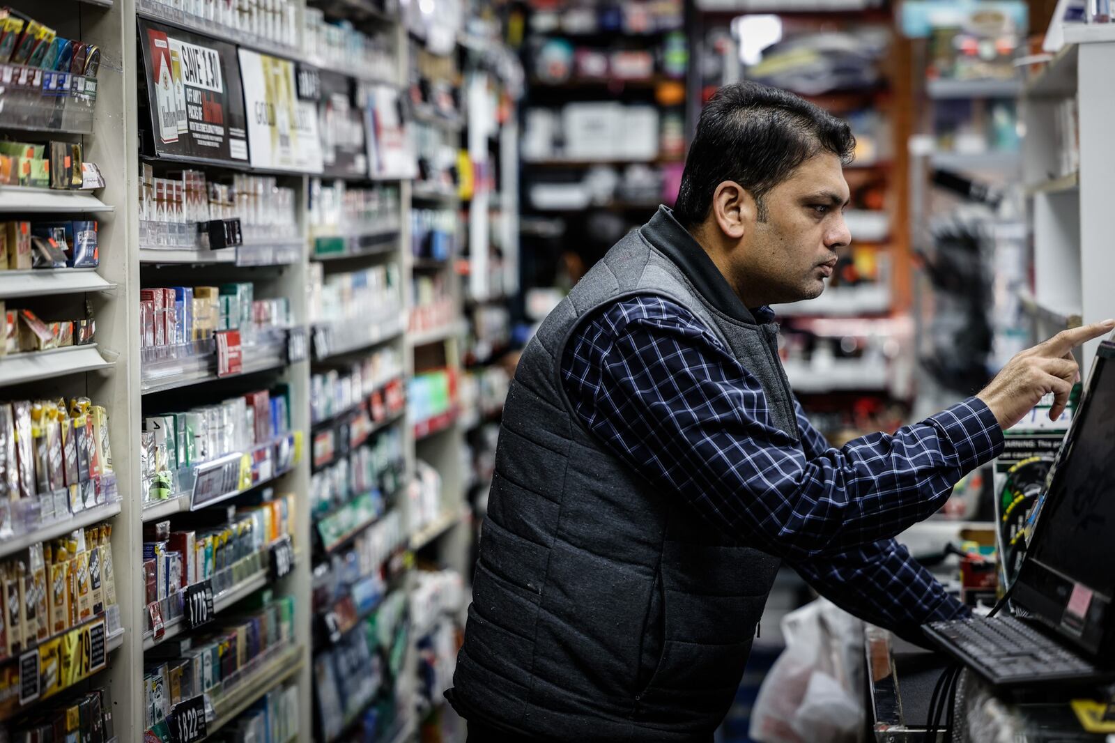 Rabi Ahmed owns the Wilmington Ave. Smokers Plus Vapes Shop in Dayton and sells Kratom. There's is proposed legislation to regulate kratom's purity and dosage. Ahmed is a US citizen who immigrated from India where his family have used kratom for years. JIM NOELKER/STAFF