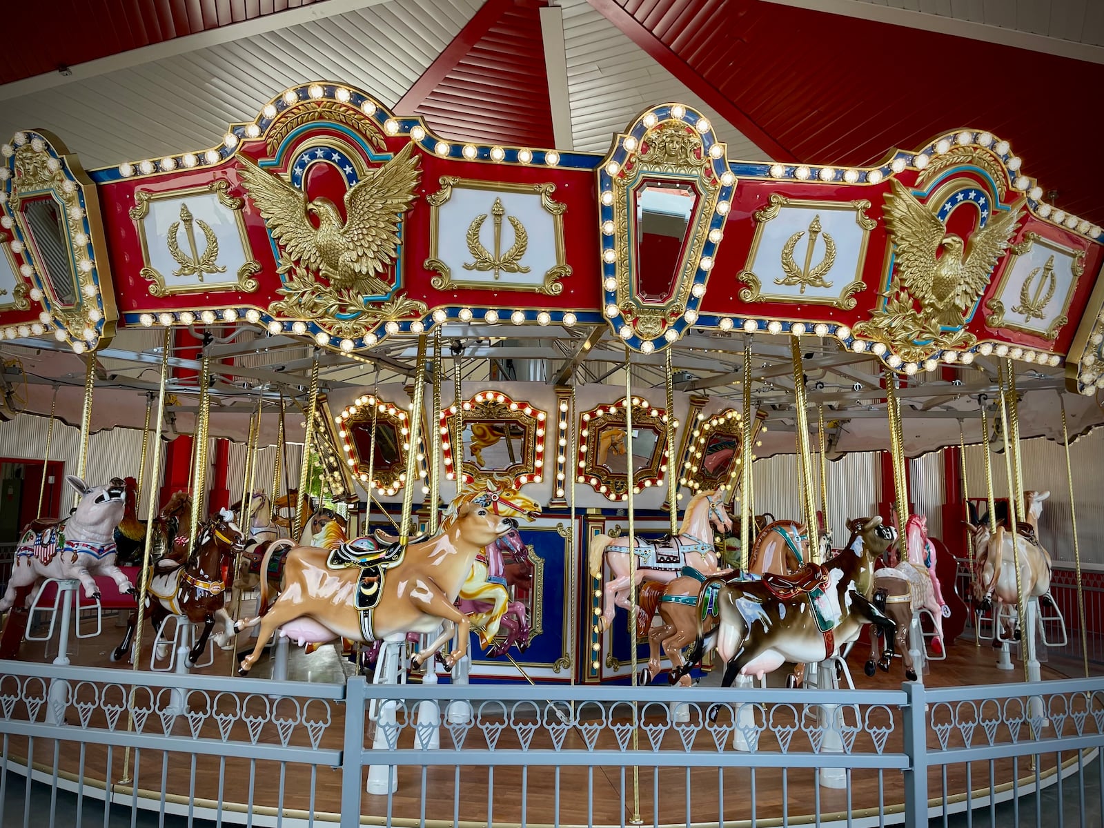 The debut of “Cowtherine’s Carousel” at Young’s Jersey Dairy is just around the corner. The 36-foot carousel featuring 21 horses, six Jersey cows, one pig, one goat and a rooster will open to the public at 7:30 p.m. on July 11. Each animal is hand painted and the horses are decorated to represent Young’s Homemade Ice Cream colors. NATALIE JONES/STAFF