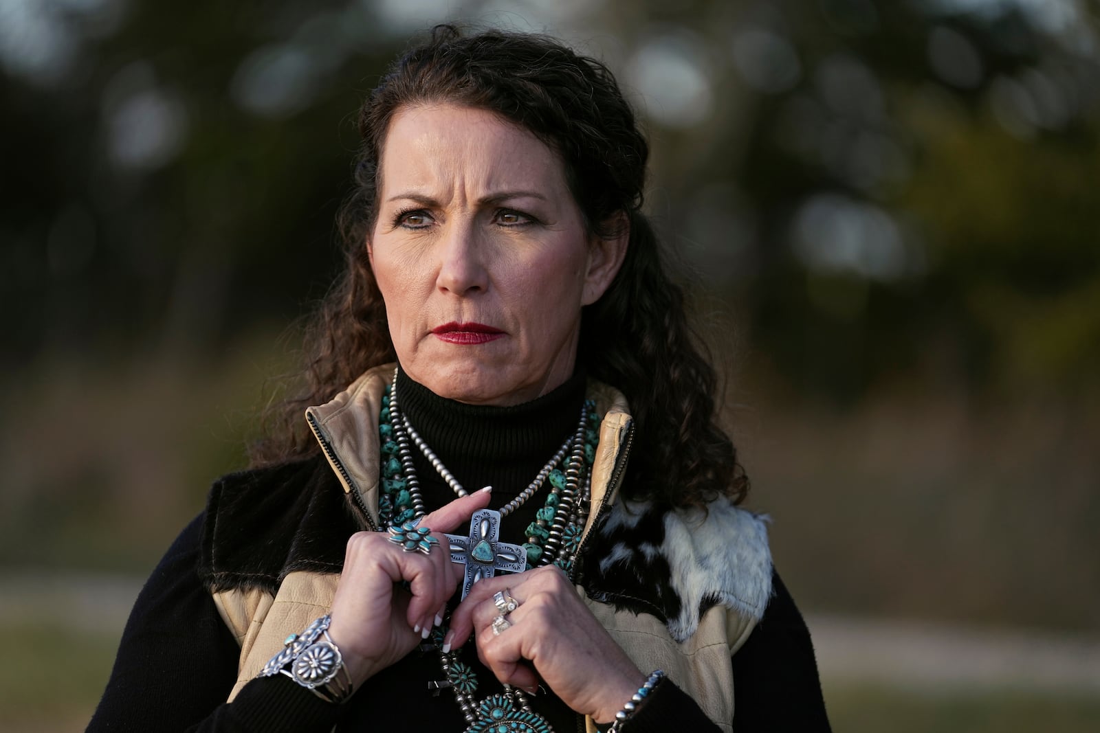 Sheri Autrey poses for a photo at her home in Cumby, Texas, Friday, Dec. 6, 2024. (AP Photo/Tony Gutierrez)