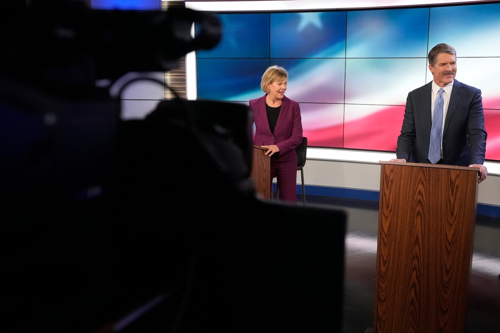 Wisconsin Senate candidates Republican Eric Hovde and Democratic U.S. Sen. Tammy Baldwin are seen before a televised debate Friday, Oct. 18, 2024, in Madison, Wis. (AP Photo/Morry Gash)