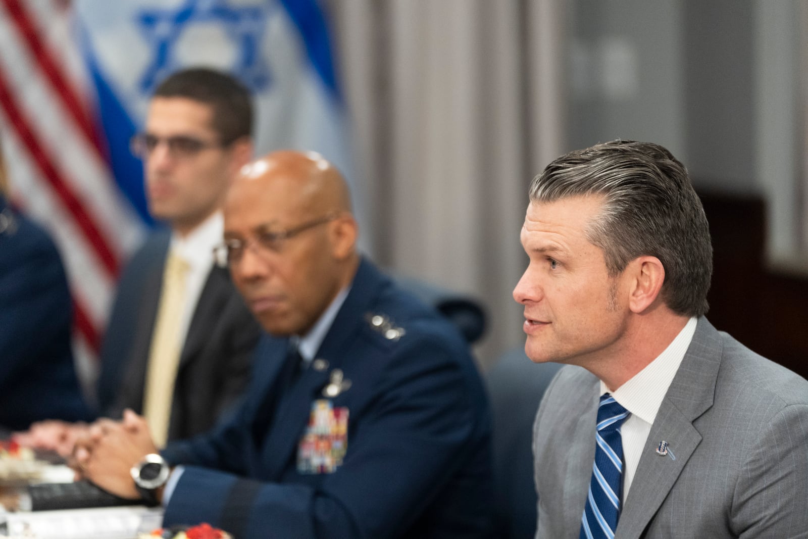 Secretary of Defense Pete Hegseth, from right, with Chairman of the Joint Chiefs of Staff Gen. CQ Brown gives his opening statement before the start of their meeting with Israeli Prime Minister Benjamin Netanyahu at the Pentagon, Wednesday, Feb. 5, 2025, in Washington. (AP Photo/Manuel Balce Ceneta)