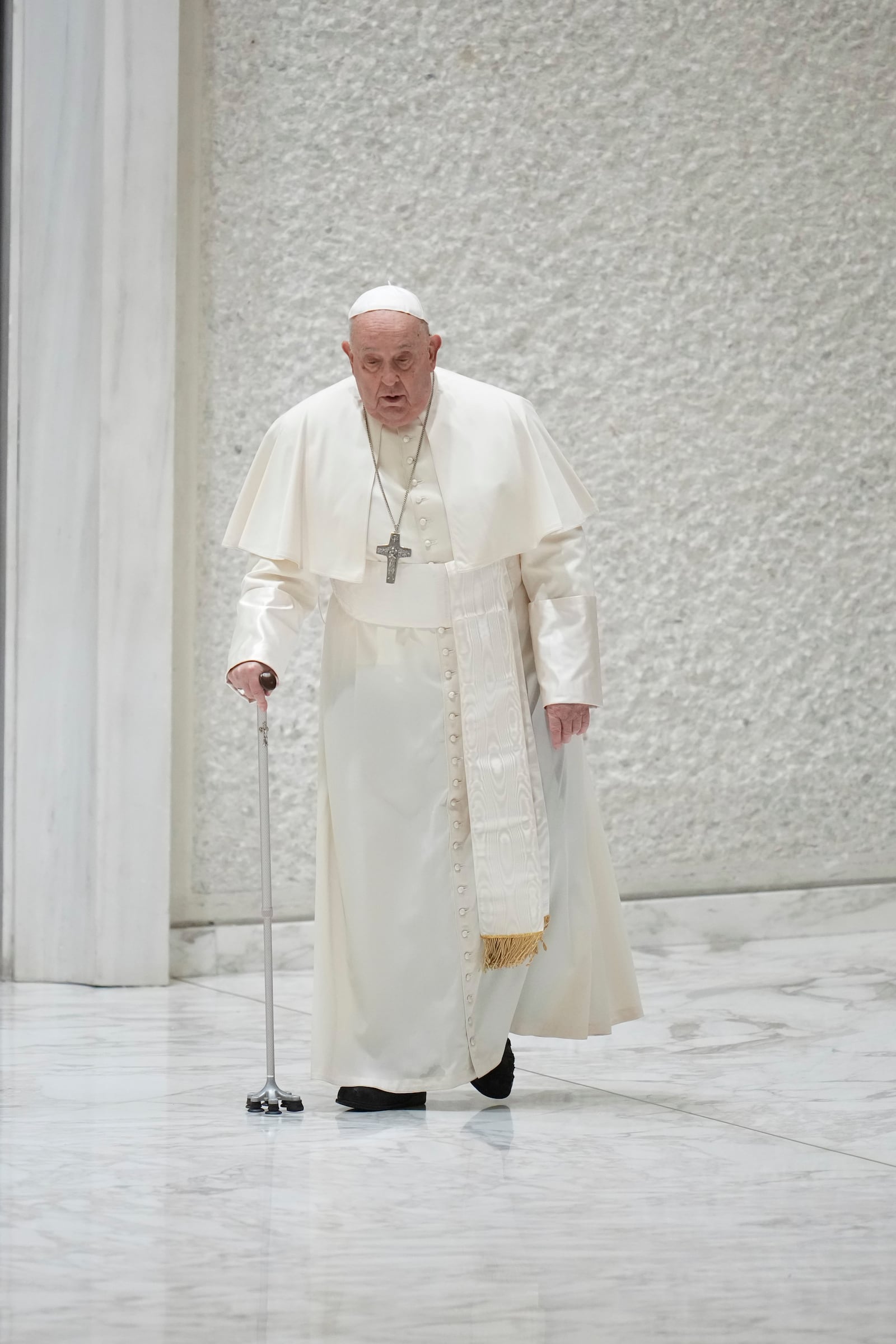 Pope Francis arrives for an audience with Catholic associations of teachers and students' parents in the Paul VI Hall, at the Vatican, Saturday, Jan. 4, 2025. (AP Photo/Alessandra Tarantino)