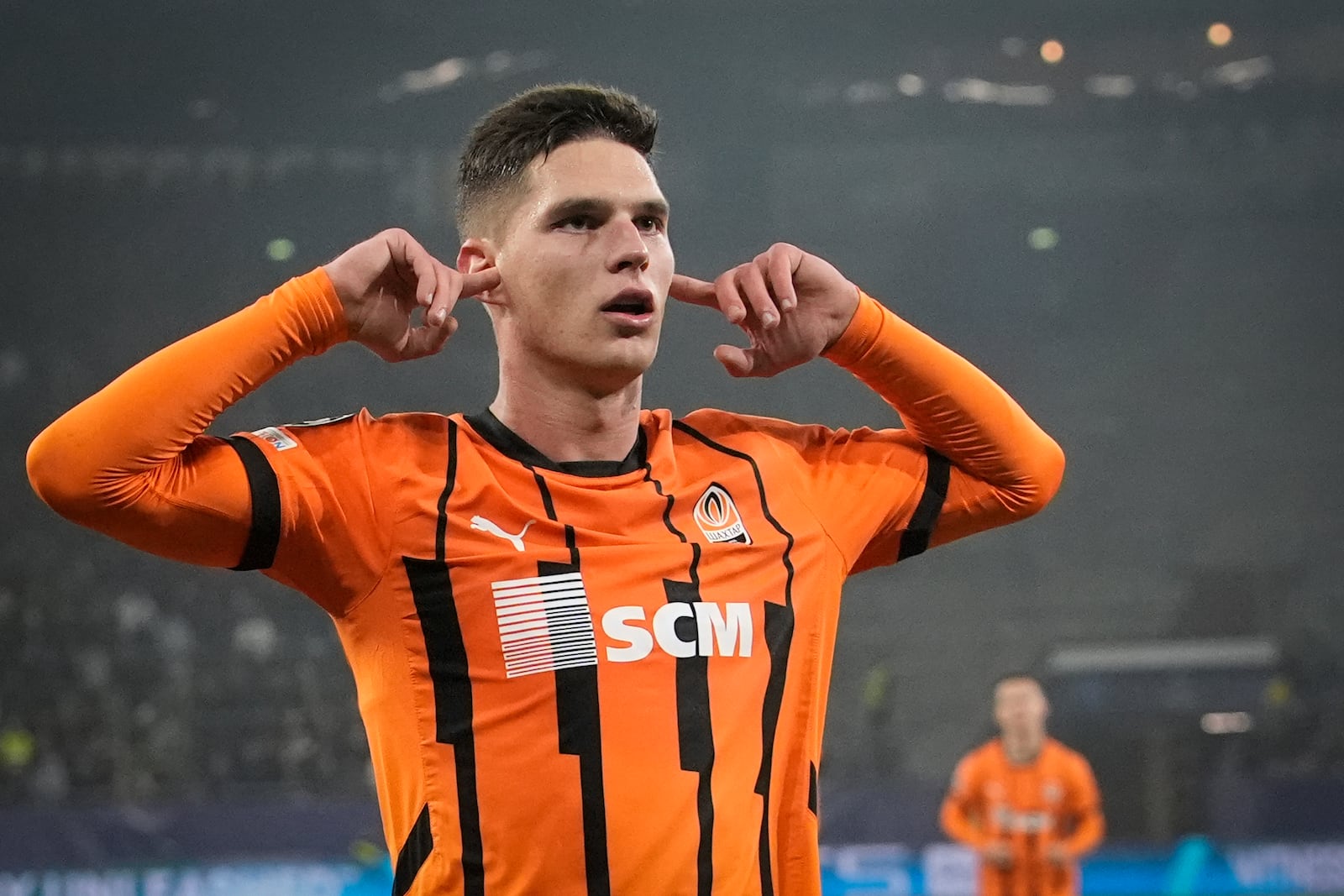 Shakhtar's Heorhiy Sudakov celebrates after scoring his side's second goal during the Champions League opening phase soccer match between Shakhtar Donetsk and Young Boys Bern at the Arena AufSchalke in Gelsenkirchen, Germany, Wednesday, Nov. 6, 2024. (AP Photo/Martin Meissner)