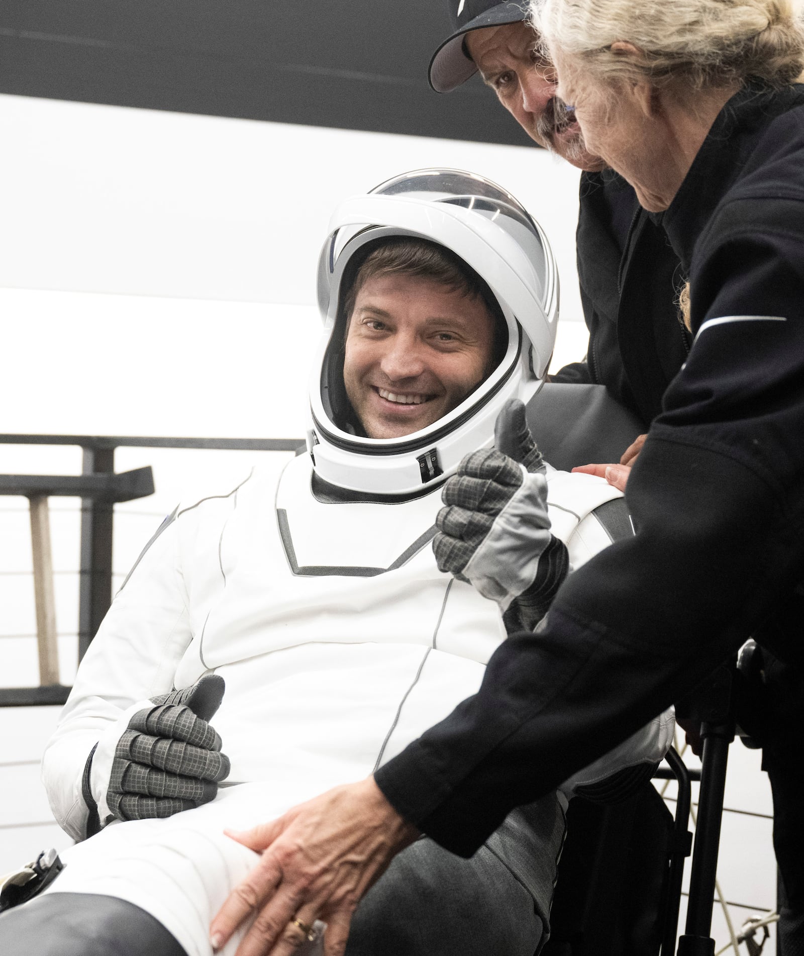 This photo provided by NASA shows NASA astronaut Matthew Dominick being helped out of the SpaceX Dragon Endeavour spacecraft onboard the SpaceX recovery ship MEGAN after he, NASA astronauts Michael Barratt, Jeanette Epps, and Roscosmos cosmonaut Alexander Grebenkin landed, in the Gulf of Mexico off the coast of Pensacola, Florida, Friday, Oct. 25, 2024. (NASA/Joel Kowsky via AP)