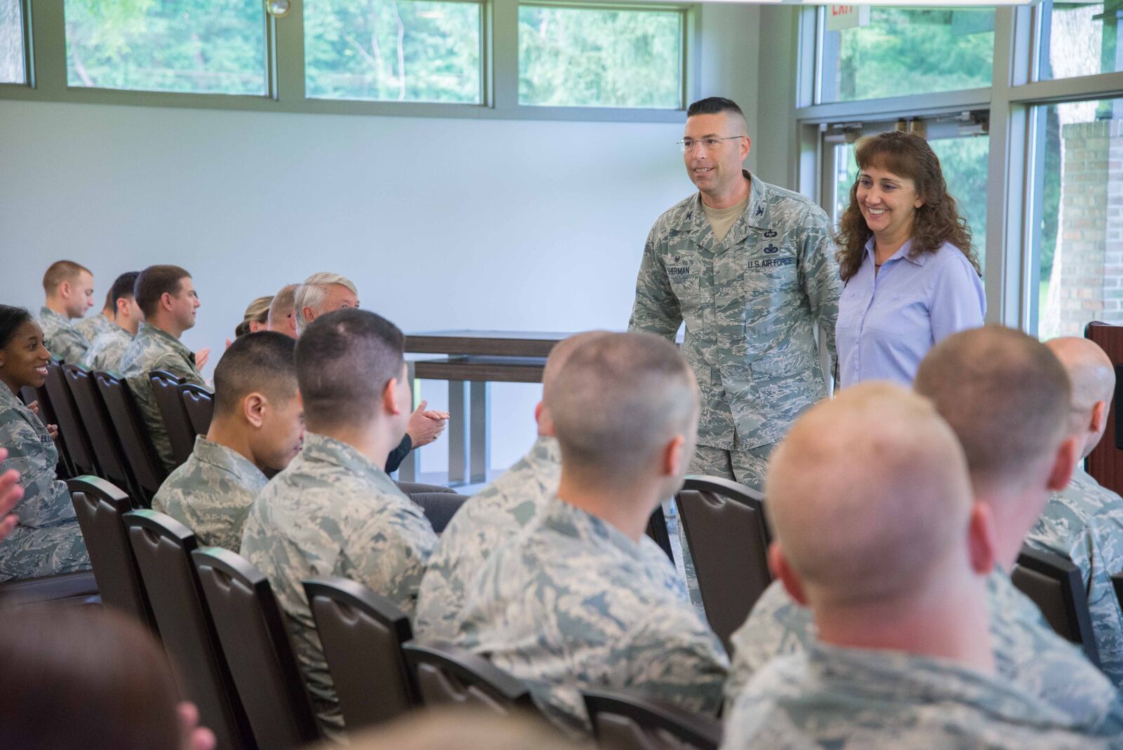 WRIGHT-PATTERSON AIR FORCE BASE, Ohio -- Col. Thomas P. Sherman, 88th Air Base Wing and Installation Commander, talks with Wing Staff Agency personnel at his first commander's call at Wright-Patterson Air Force Base  held at the Twin Base Golf Course June 26, 2018. Sherman took command one week earlier in a ceremony at the National Museum of the United States Air Force June 19. (U.S. Air Force photo/John Harrington)