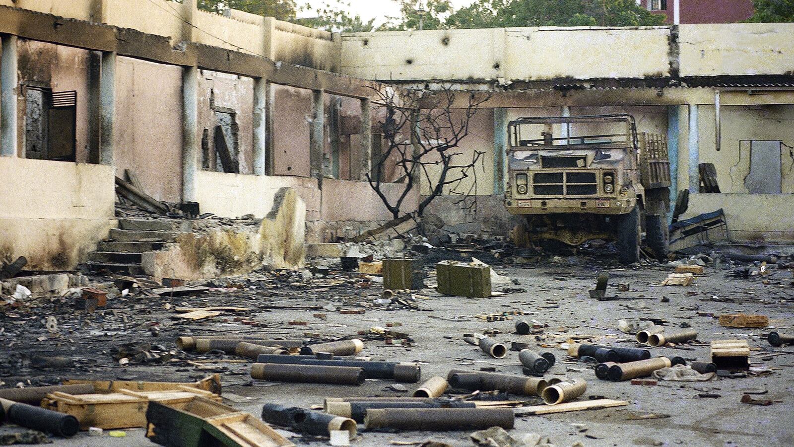 Empty shell casings are seen scattered inside the army barracks on the grounds of the presidential palace in Mogadishu, Somalia, on Jan. 29, 1991 after fighting ended with the overthrow of then-President Jaalle Mohamed Siad Barre. Yusuf Abdi Ali, who served as a commander under Siad Barre, was found liable Tuesday, May 21, 2019, in a federal court in Virginia for the torture of a then-17-year-old Somali farmer in 1987. A jury ordered Ali to pay $500,000 to the victim, Farhan Warfaa.