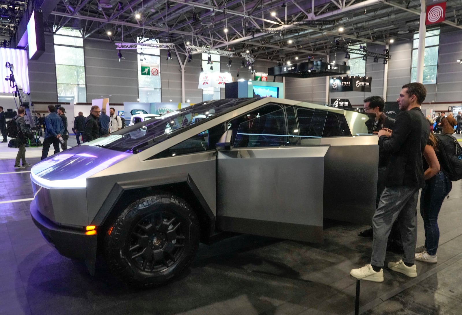 The Tesla Cybertruck is photographed during press day at the Paris Auto Show d, in Paris, Monday, Oct. 14, 2024. (AP Photo/Michel Euler)