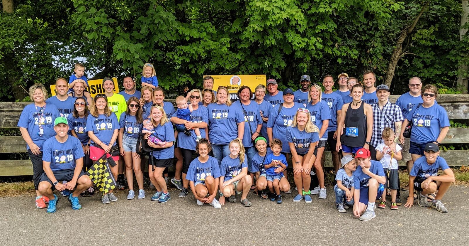 Race volunteers pose for a photo at the 2019 Happy Half Marathon in Springfield.