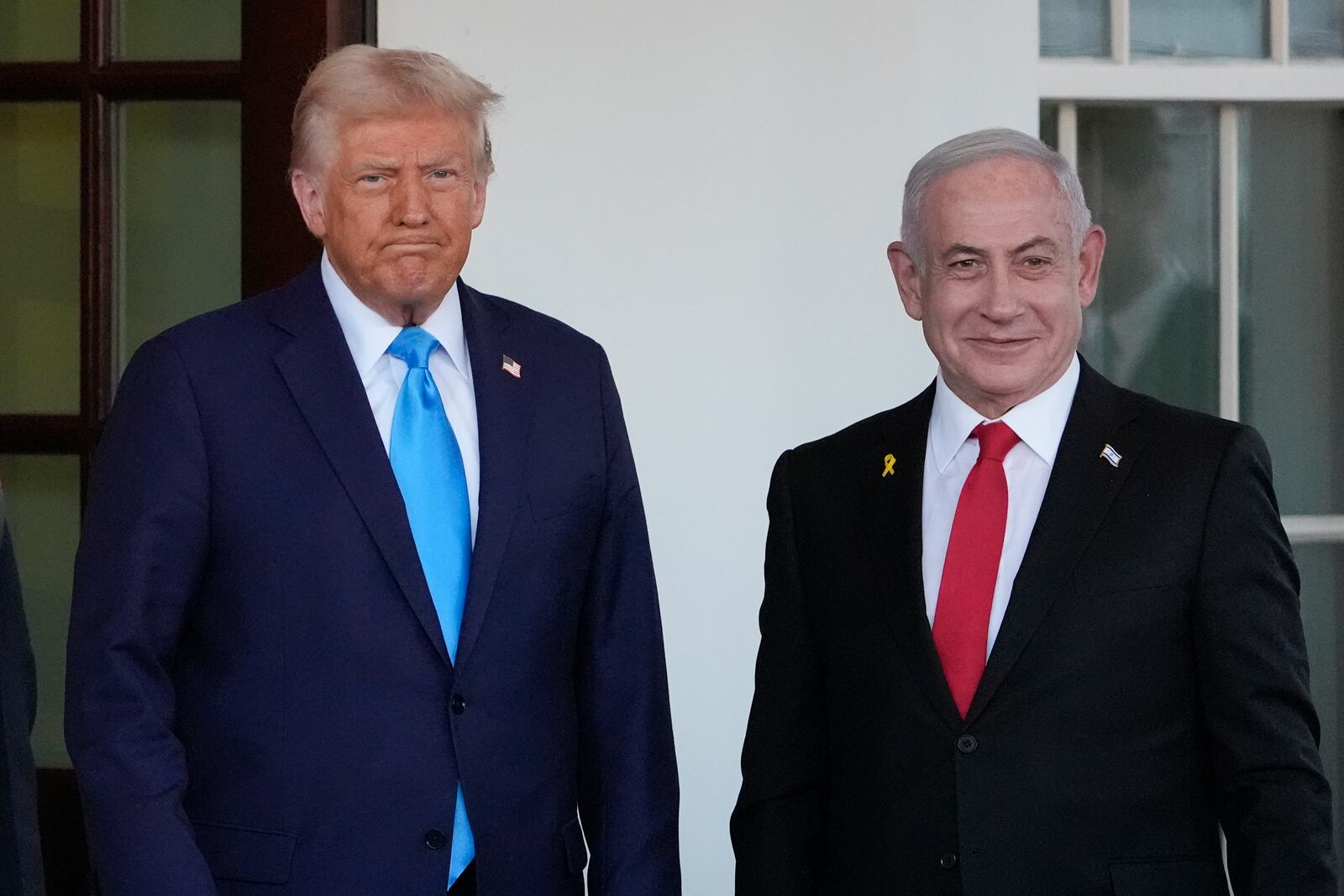 President Donald Trump greets Israeli Prime Minister Benjamin Netanyahu as he arrives at the West Wing of the White House, Tuesday, Feb. 4, 2025, in Washington. (AP Photo/Alex Brandon)