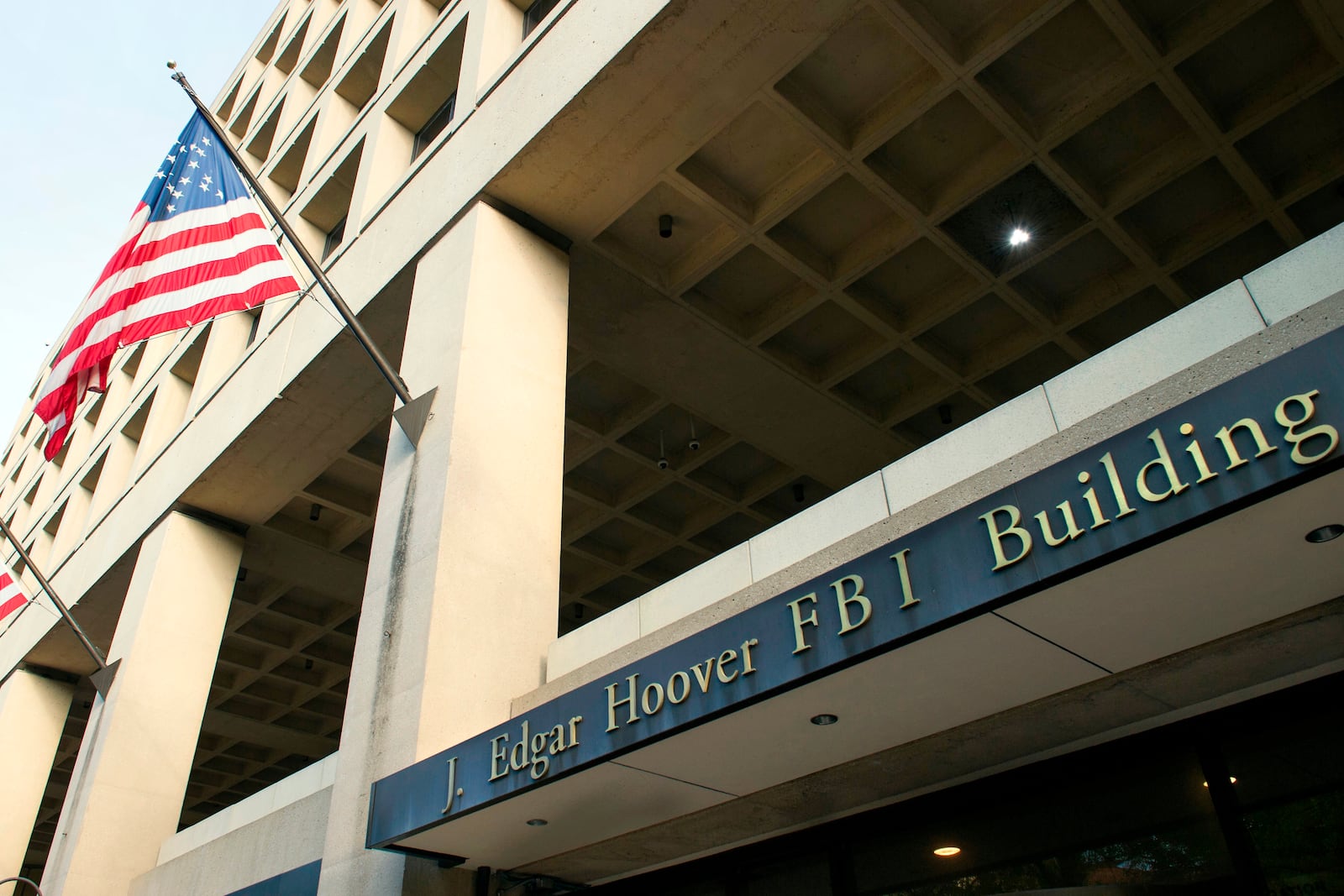 FILE - The FBI's J. Edgar Hoover headquarters building is seen in Washington, Nov. 2, 2016. (AP Photo/Cliff Owen, File)