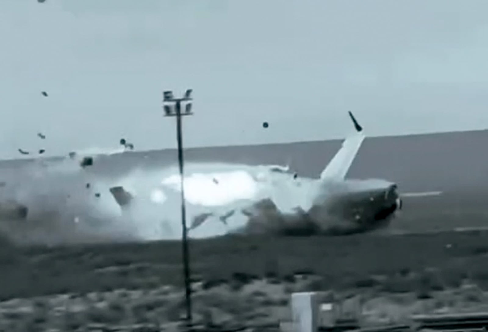 This image from video released by Kazakhstan Emergency Ministry Press Service on Friday, Dec. 27, 2024, shows the crash landing of the Azerbaijan Airlines' Embraer 190 on the ground near the airport of Aktau, Kazakhstan, on Thursday, Dec. 26, 2024. (Kazakhstan Emergency Ministry Press Service via AP)