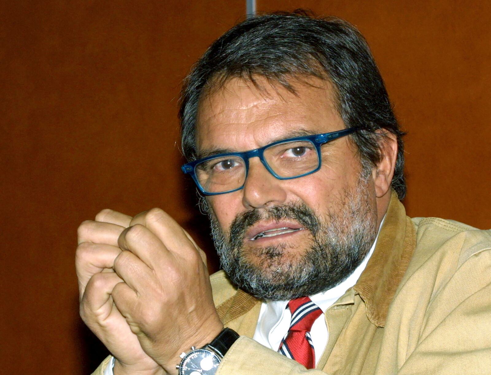 FILE - Italian photographer Oliviero Toscani attends a press conference on tobacco advertising in Geneva, Switzerland, Thursday, March 21, 2002. (AP Photo/ Donald Stampfli, File)