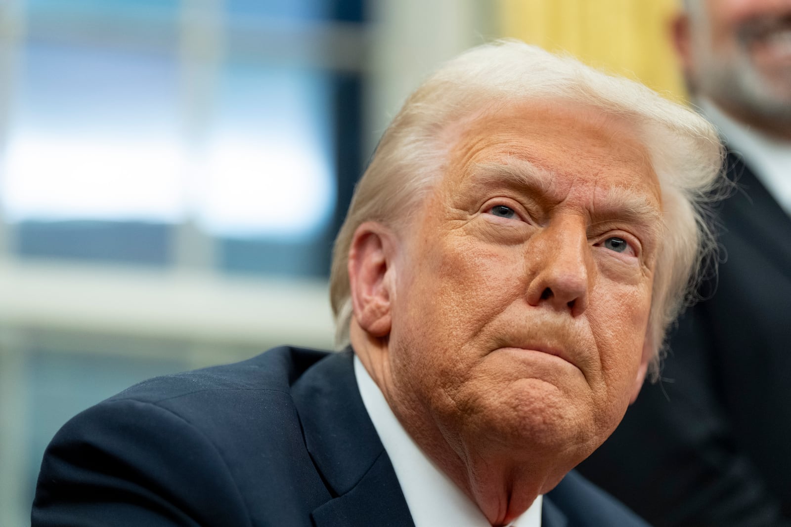 President Donald Trump speaks with reporters as he signs executive orders in the Oval Office at the White House, Monday, Feb. 10, 2025, in Washington. (Photo/Alex Brandon)