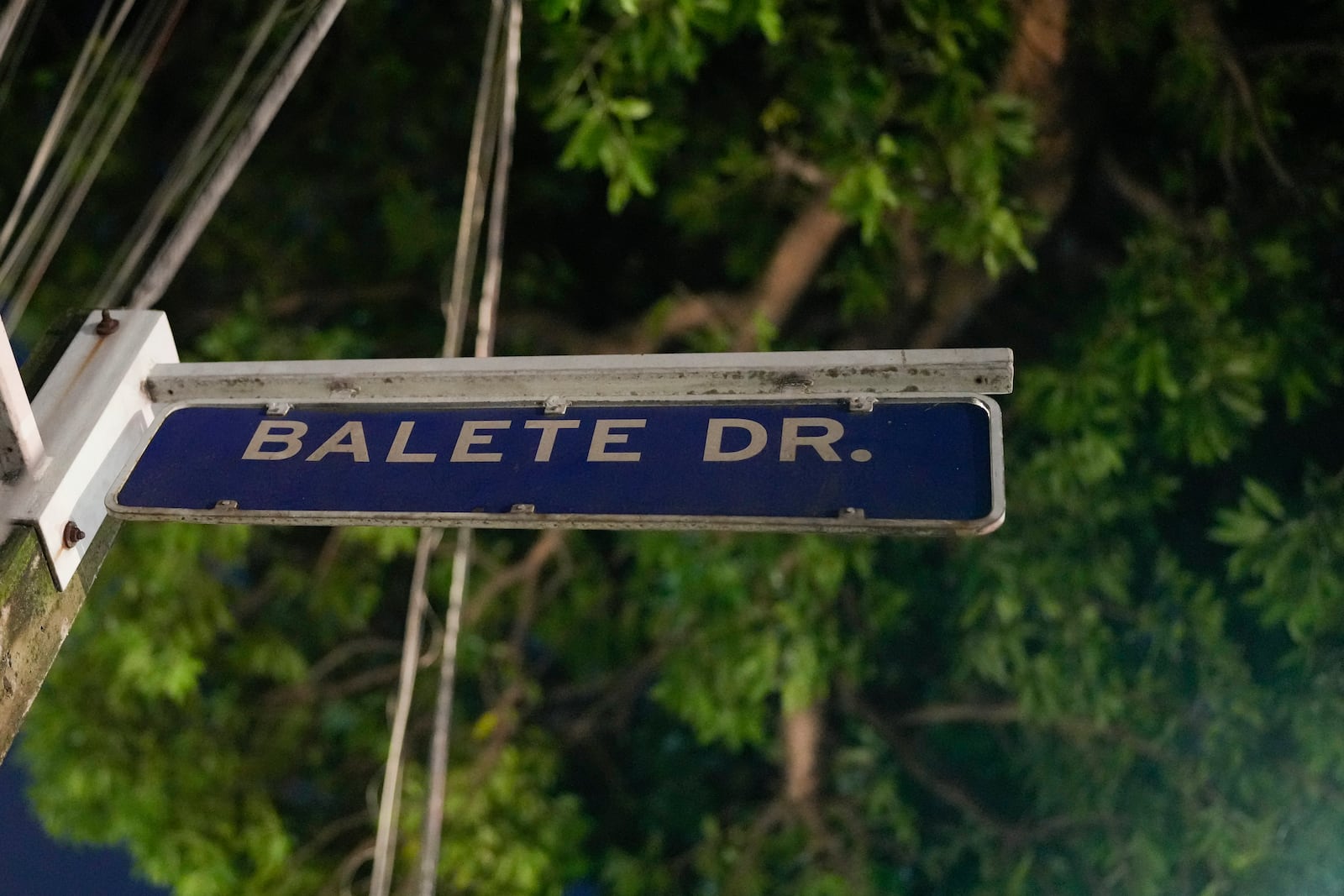 A street sign for Balete Drive is seen in Quezon City, Philippines, Friday, Oct. 25, 2024. (AP Photo/Aaron Favila)