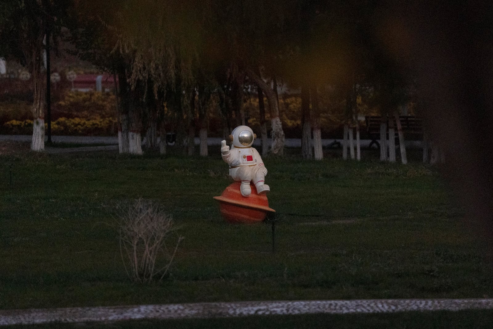 A sculpture depicting a Chinese astronaut is seen at a park ahead of the Shenzhou-19 mission at the Jiuquan Satellite Launch Center in Jiuquan, northwestern China Tuesday, Oct. 29, 2024. (AP Photo/Ng Han Guan)