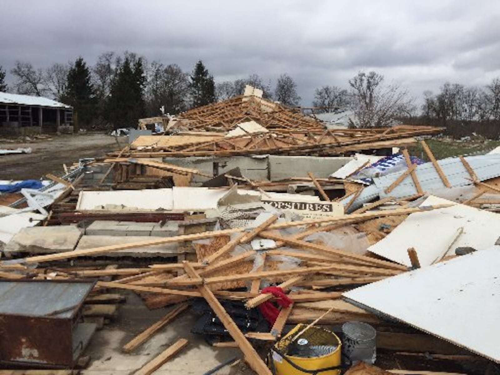 Greene County farmer Randy Rife said his farm at 2423 Clifton Road lost a porch, grain bins, barns, three ewes and two lambs in an early April tornado. STAFF PHOTO