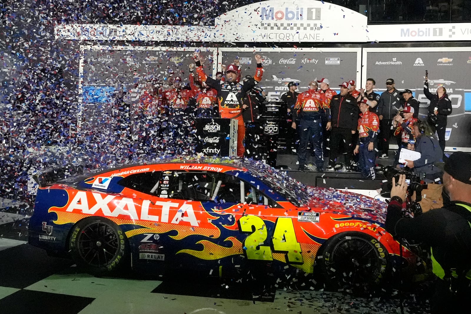 William Byron celebrates with his crew in Victory Lane after winning the NASCAR Daytona 500 auto race at Daytona International Speedway, Sunday, Feb. 16, 2025, in Daytona Beach, Fla. (AP Photo/John Raoux)