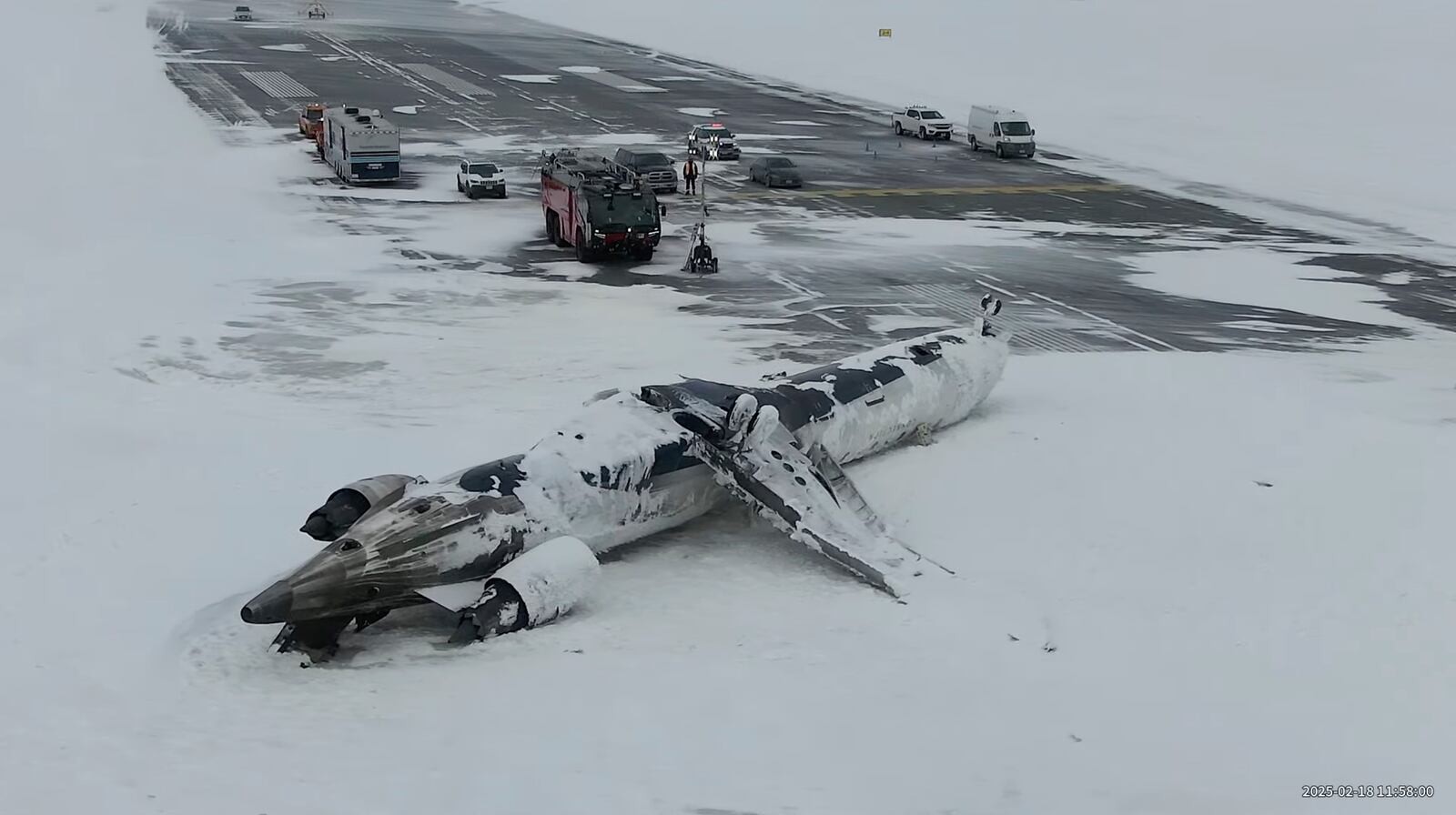 This image taken from video released by the Transportation Safety Board of Canada on Wednesday, Feb. 19, 2025, shows the crashed plane of Delta flight 4819 at Toronto Pearson International Airport, in Mississauga, Ontario, on Tuesday, Feb. 18. (Transportation Safety Board of Canada via AP)