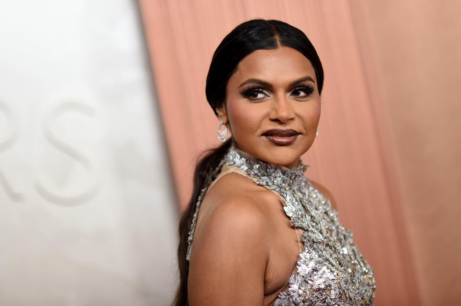 Mindy Kaling arrives at the Oscars on Sunday, March 2, 2025, at the Dolby Theatre in Los Angeles. (Photo by Richard Shotwell/Invision/AP)