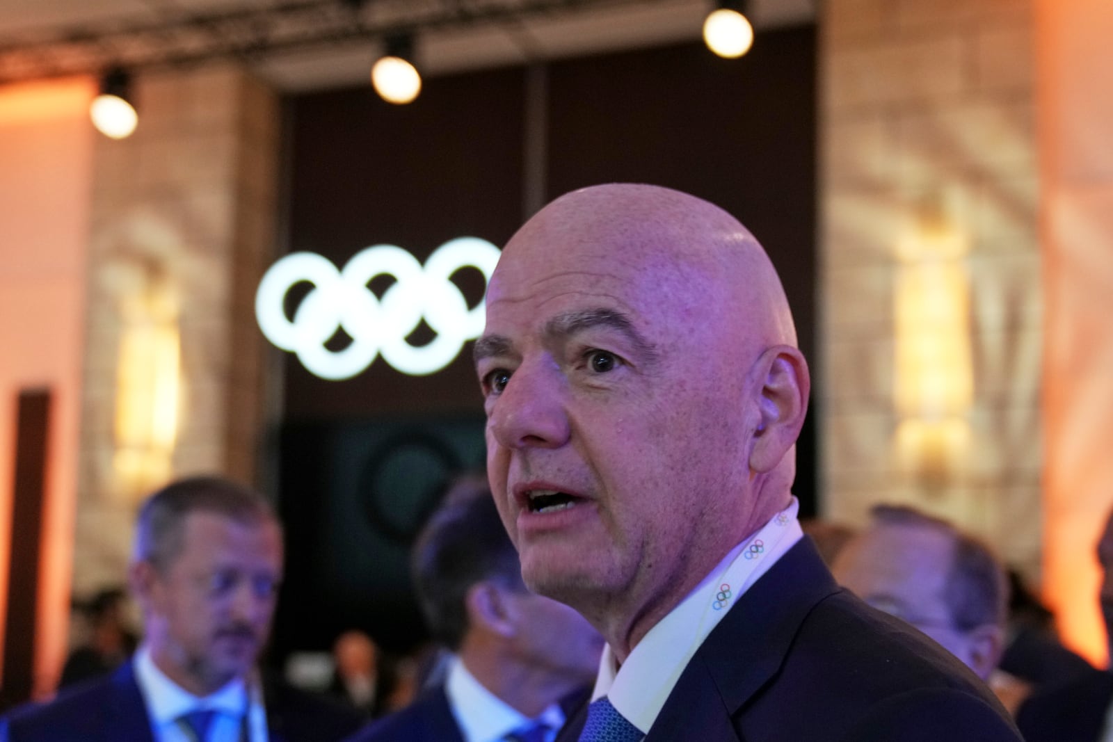 FIFA President Gianni Infantino arrives for the 144th International Olympic Committee session, which will elect the new IOC President, in Costa Navarino, western Greece, Thursday, March 20, 2025. (AP Photo/Thanassis Stavrakis)