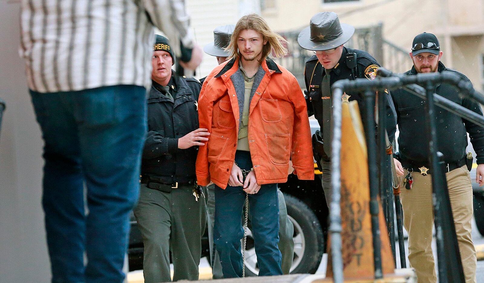 Edward "Jake" Wagner planned to plead guilty to eight counts of aggravated murder. In exchange, prosecutors have dropped the possibility of a death sentence on Thursday, April 22, 2021. Wagner is shown escorted by police into the holding area in the Pike County Common Pleas Court in Waverly, Ohio, in this Nov. 27, 2018, file photo. (Brooke Laay, Valley/The Columbus Dispatch via AP, File)