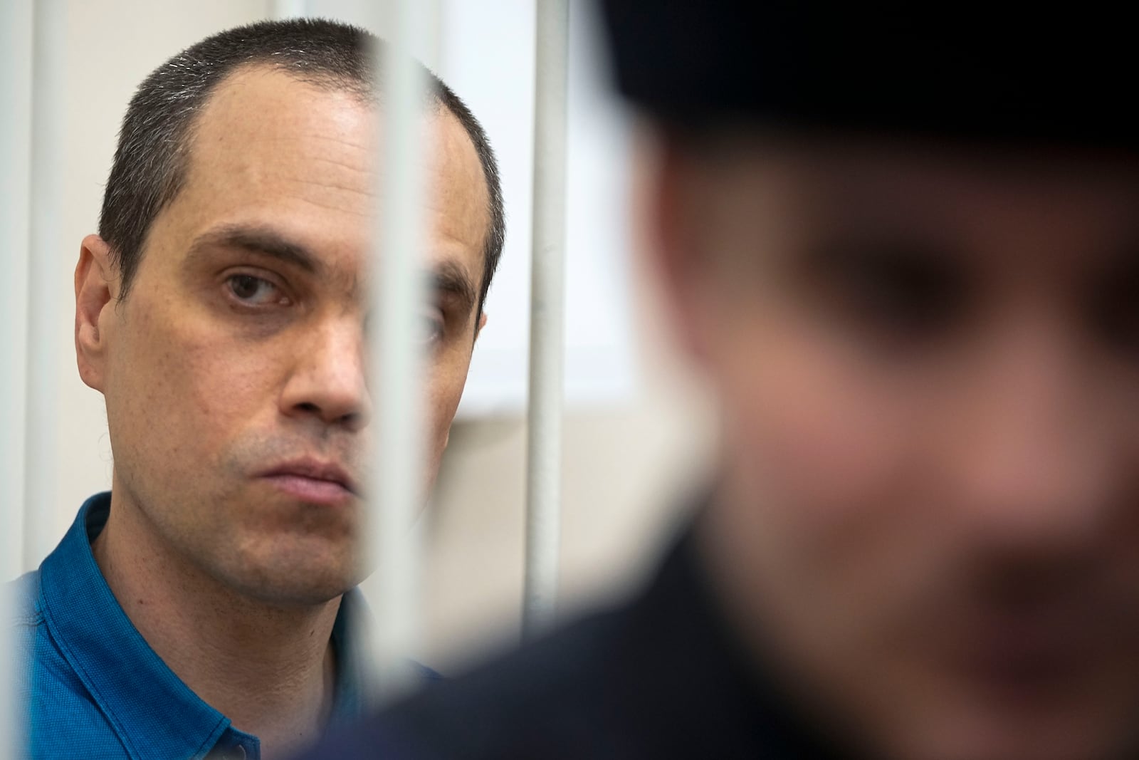 Vadim Kobzev, one of three lawyers, who once represented late opposition leader Alexei Navalny, stands in a courtroom in Petushki, Vladimir region, about 120 kilometers (75 miles) east of Moscow, Russia, Friday, Jan. 17, 2025. (AP Photo/Pavel Bednyakov)