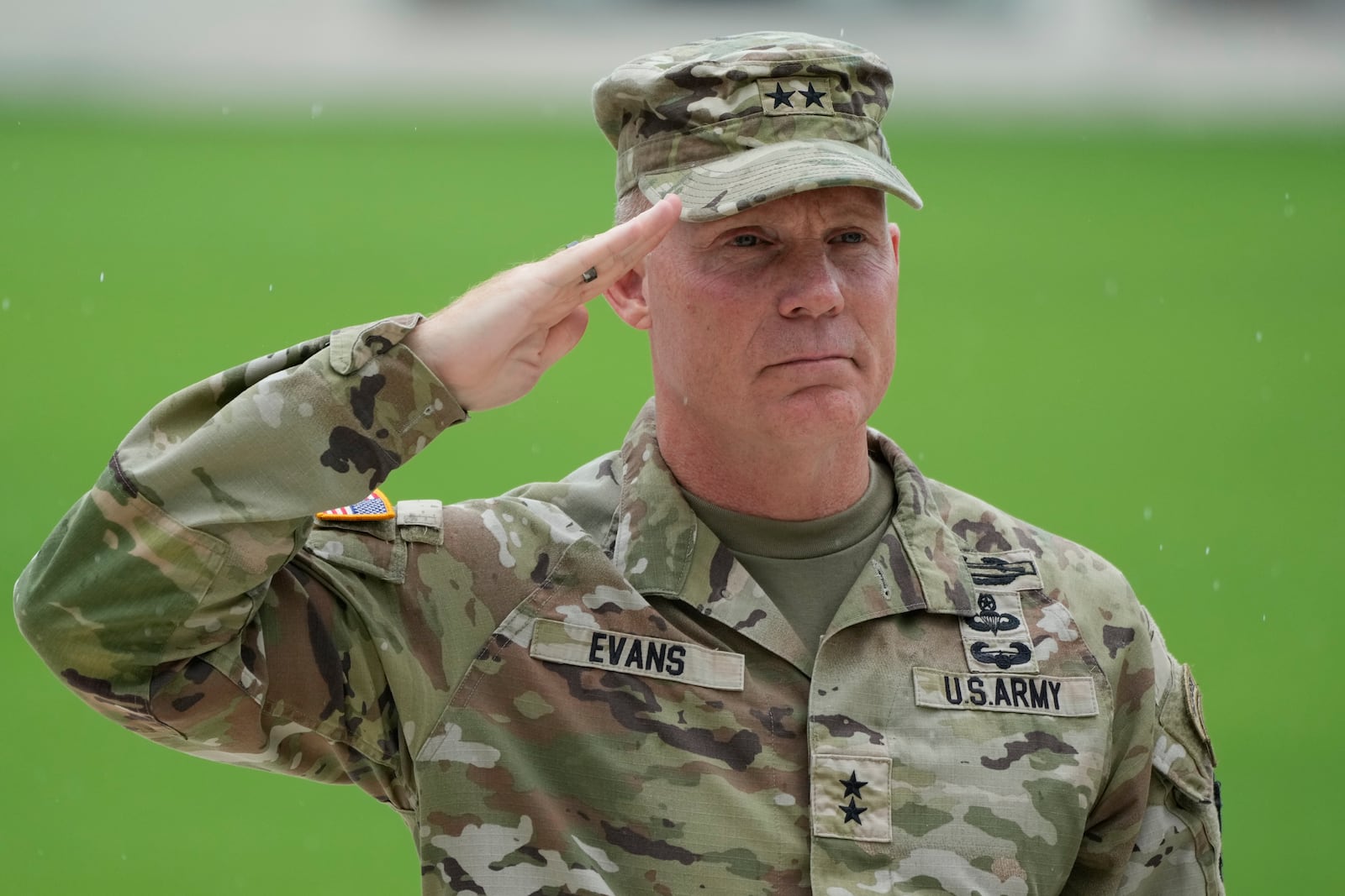 U.S. Maj. Gen. Marcus Evans, commanding general of the U.S. Army's 25th Infantry Division, salutes during a wreath laying rite to honor American soldiers died during World War II at the Manila American Cemetery and Memorial in Taguig, Philippines Monday, Oct. 21, 2024. (AP Photo/Aaron Favila)