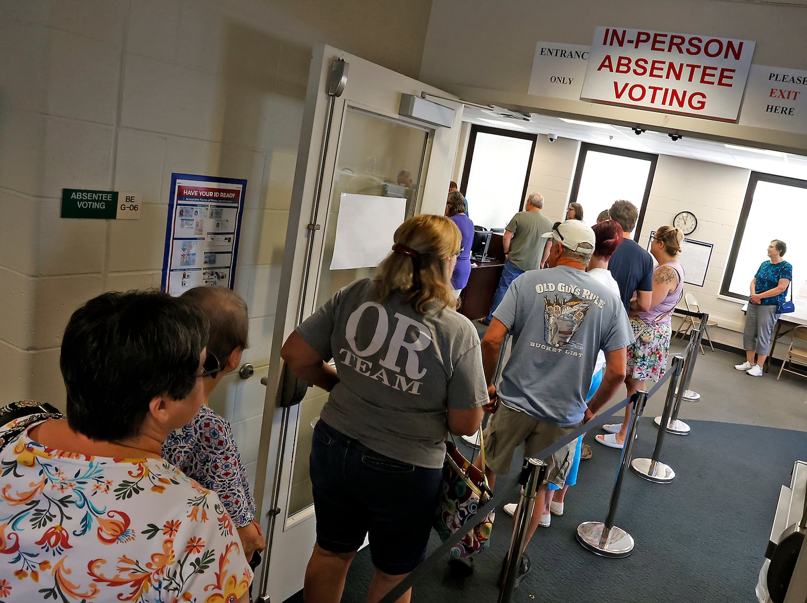 People wait in line to vote early at the Clark County Board of Elections Friday, August 4, 2023. BILL LACKEY/STAFF