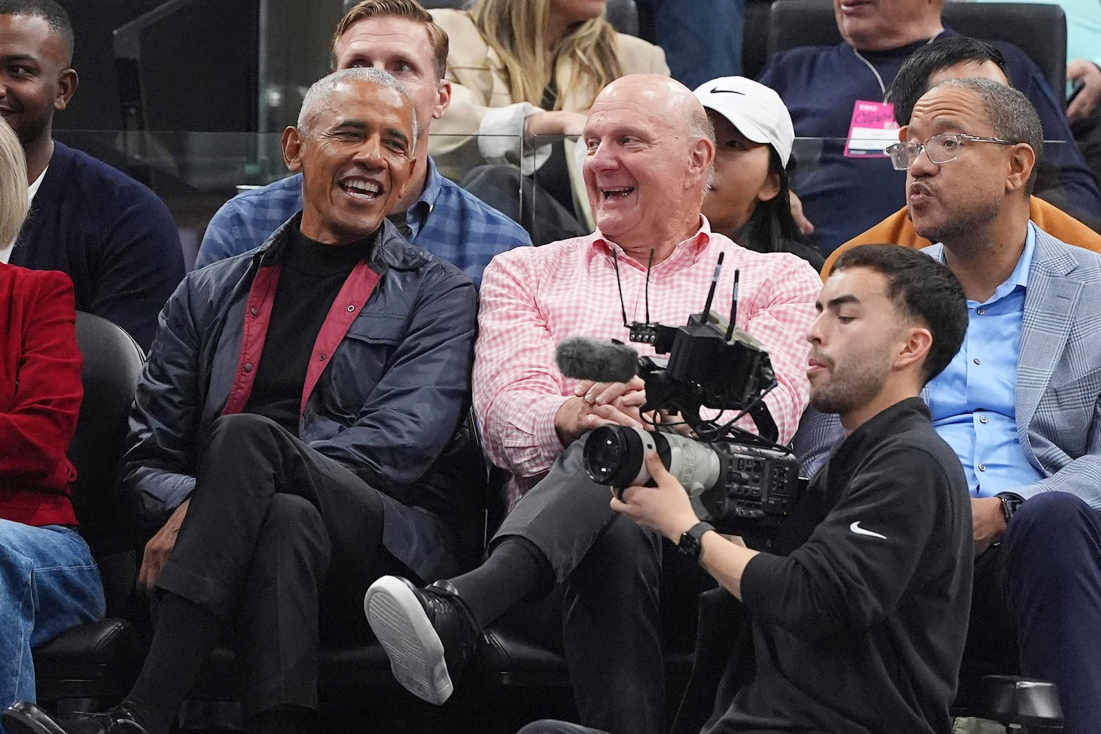 Former President Barack Obama, left, sits with Los Angeles Clippers owner Steve Ballmer during the first half of an NBA basketball game between the Clippers and the Detroit Pistons, Wednesday, March 5, 2025, in Inglewood, Calif. (AP Photo/Mark J. Terrill)