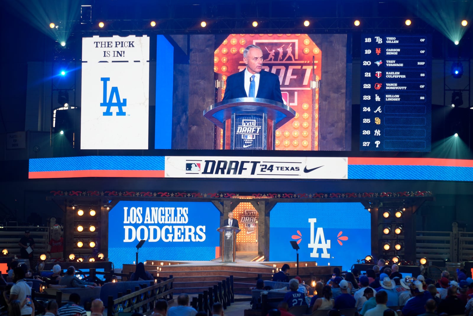 FILE - Major League Baseball Commissioner Rob Manfred announces the selection made by the Los Angeles Dodgers in the first round of the MLB baseball draft in Fort Worth, Texas, July 14, 2024. (AP Photo/LM Otero, File)