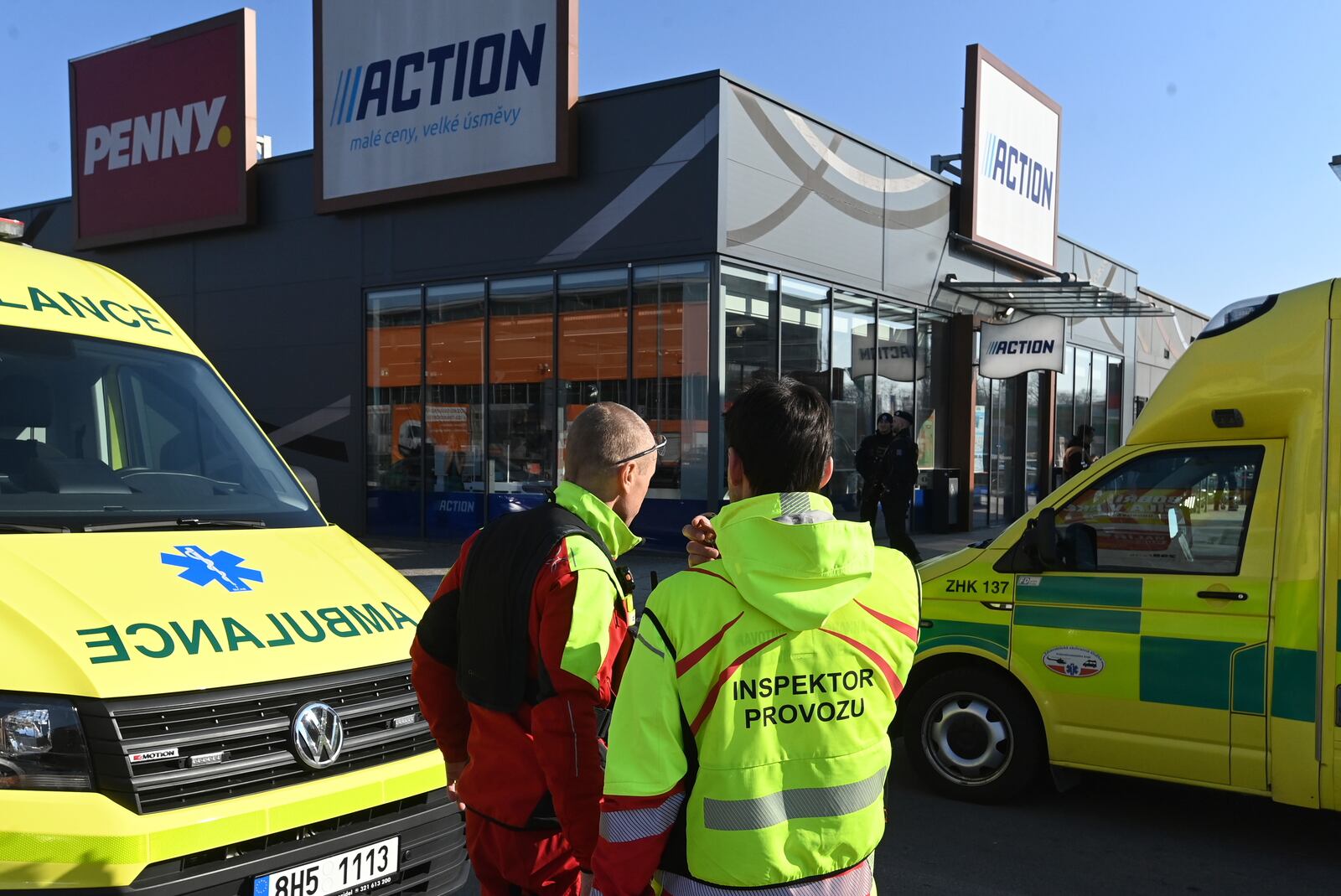 Police and ambulances are seen in a shopping area in Hradec Kralove, Czech Republic, where two women died after a knife attack, Thursday, Feb 20, 2025. (Josef Costarek/CTK via AP)