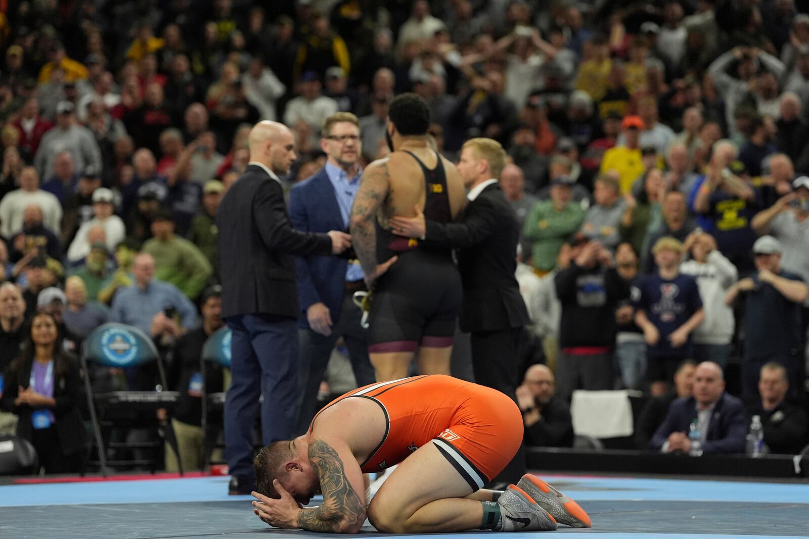 Oklahoma State's Wyatt Hendrickson reacts after defeating Minnesota's Gable Steveson during a 285-pound match in the finals at the NCAA wrestling championship, Saturday, March 22, 2025, in Philadelphia. (AP Photo/Matt Rourke)