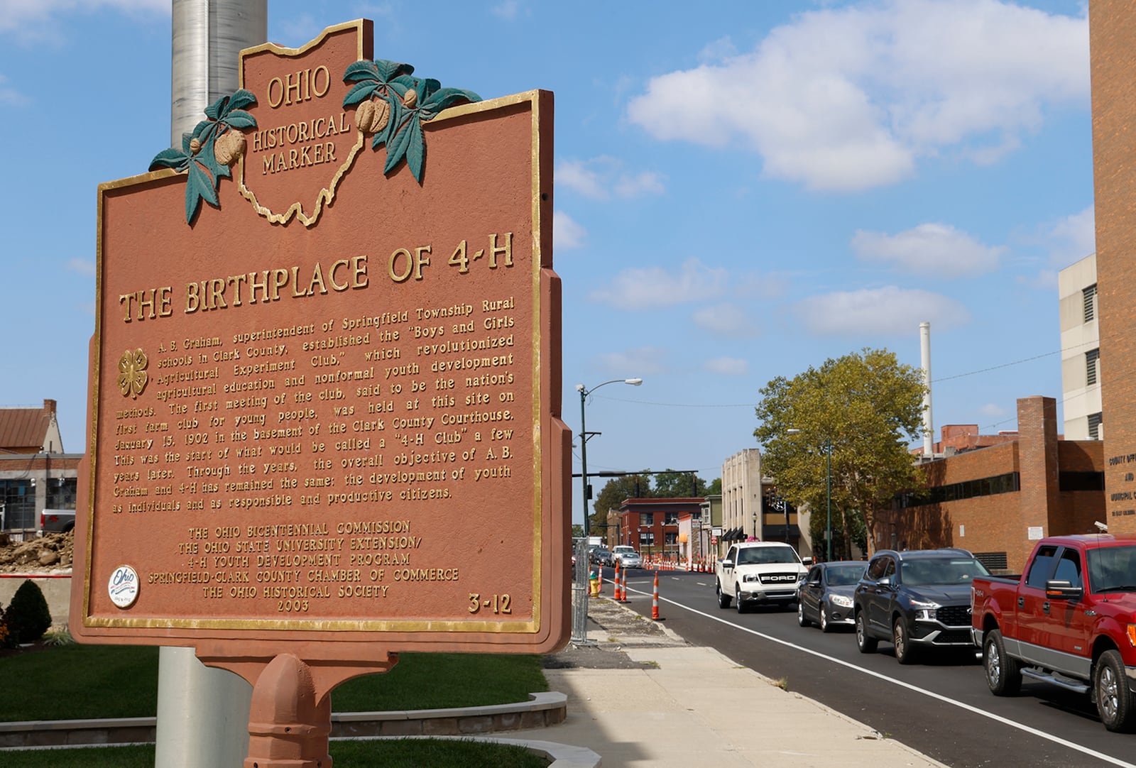 A Historical Marker outside the A.B. Graham Building Monday, Sept. 11, 2023 marks the building as the birthplace of 4-H. BILL LACKEY/STAFF