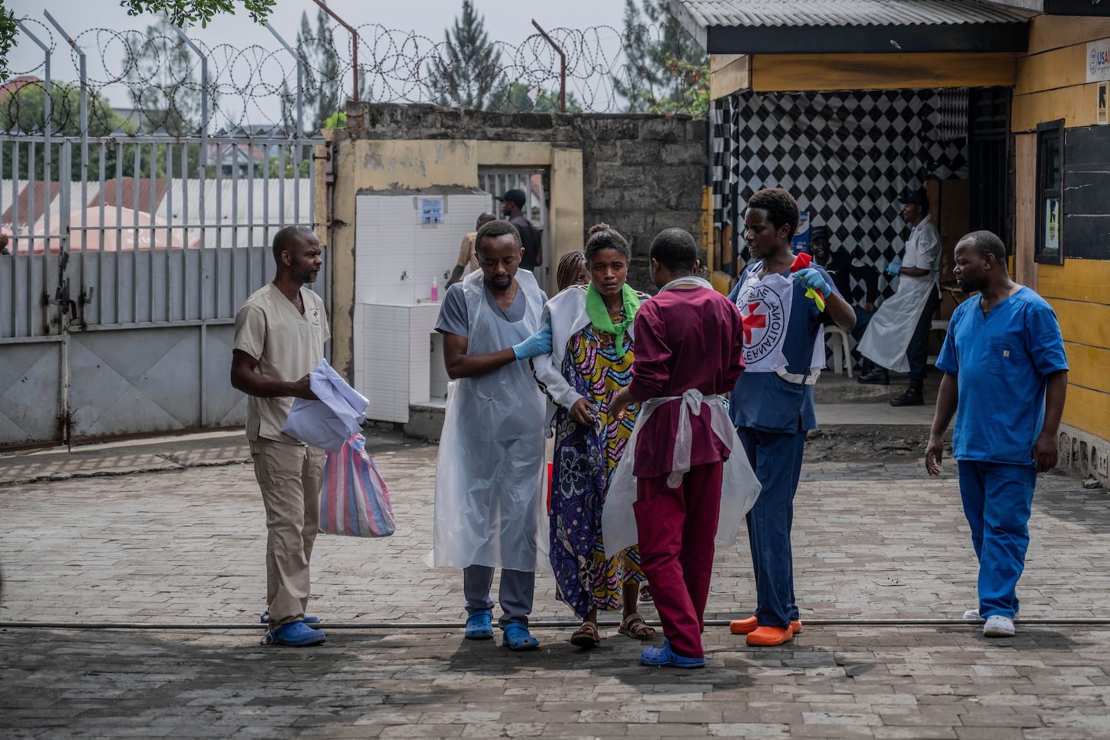 People wounded in the fighting between M23 rebels and Congolese armed forces arrive at the Cbeca Ndosho hospital in Goma, Democratic Republic of the Congo, Thursday, Jan. 23, 2025. (AP Photo/Moses Sawasawa)